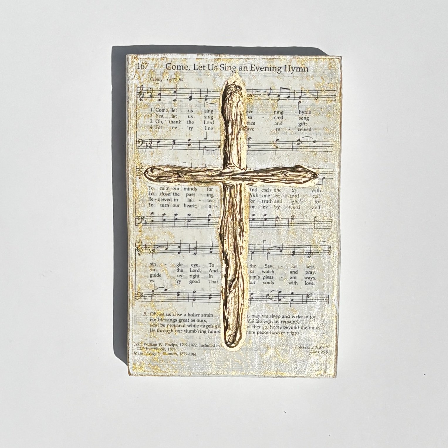 Golden Textured Cross on Hymnal Pages-1