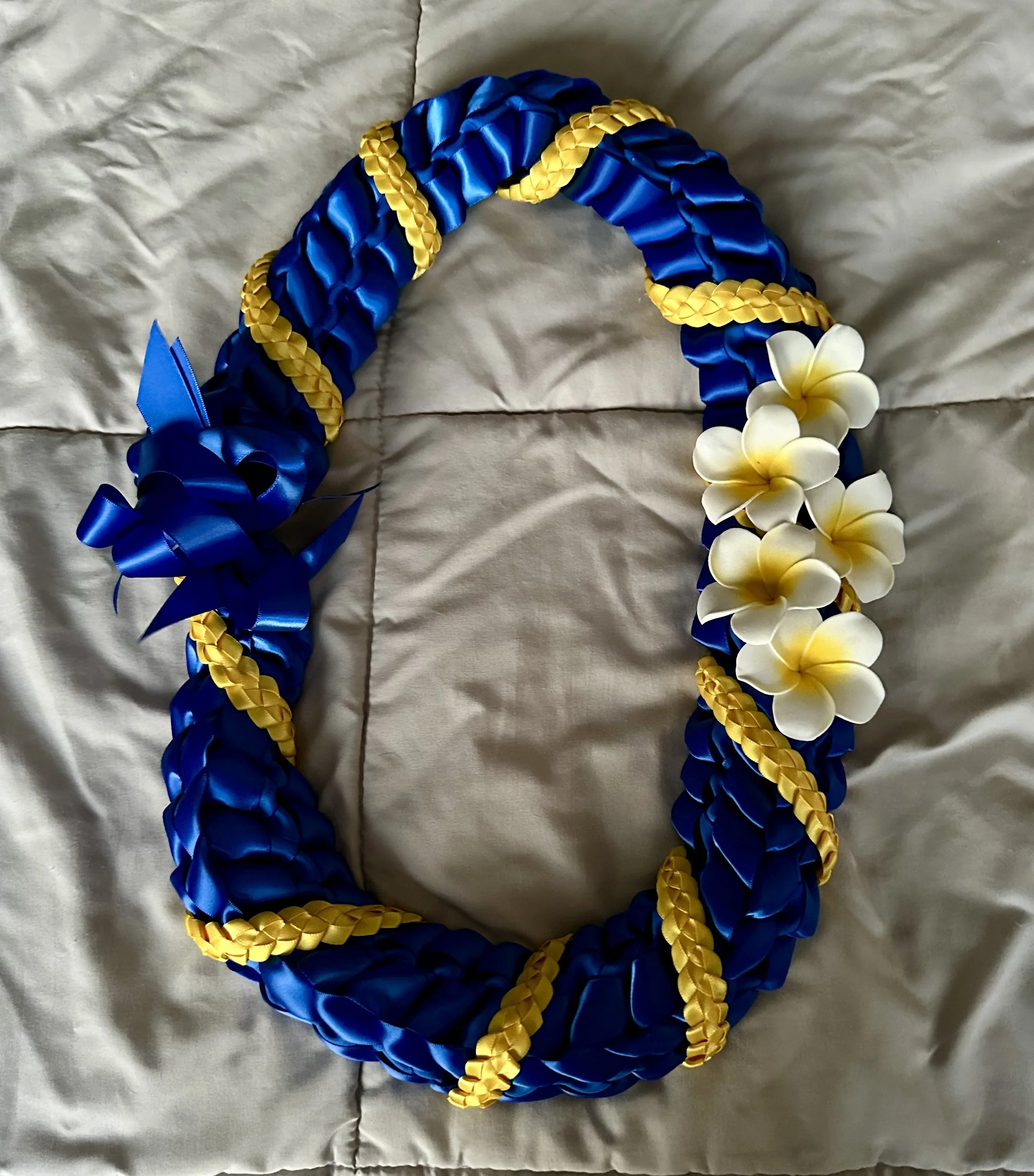 Colored twist with plumeria $50.00