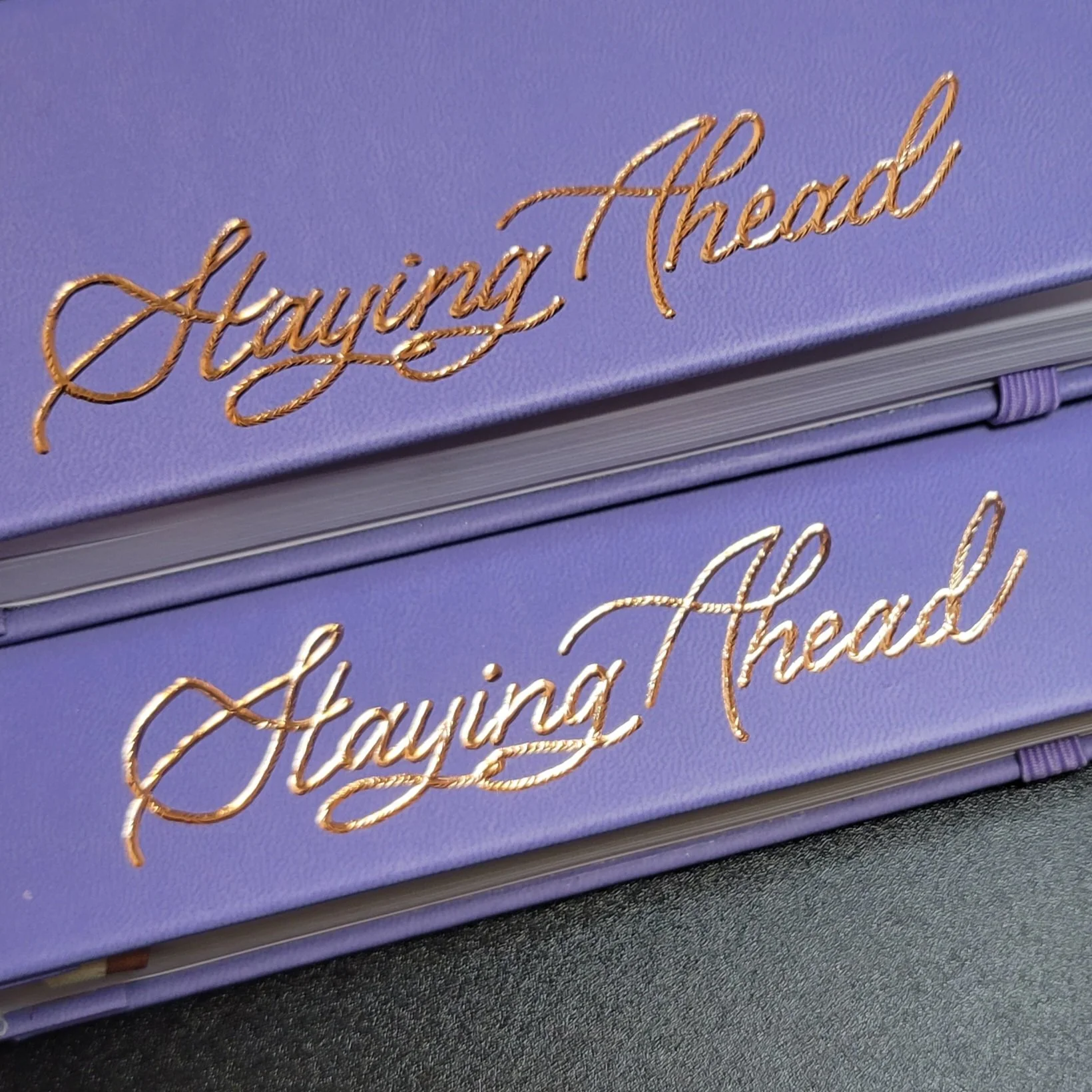 oklahoma_city_calligrapher_letter10_design_hot_foiled_leather_journals_purple.jpg