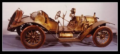 Roadster with Monacle window, 5 1/2 ft. L; brass, steel, wood, glass, leather. Circa 1970s.