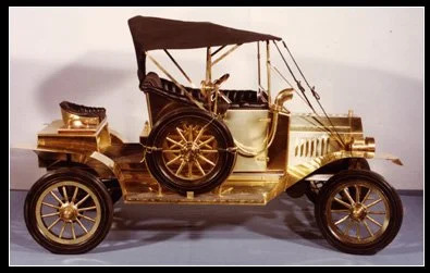 Model T Ford, 5 1/2 ft. L; brass, steel, wood, glass, leather. Circa 1970s.