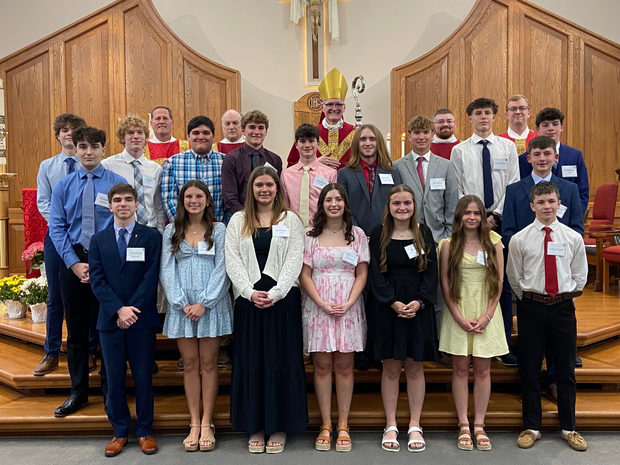 Congrats to our 18 sophomores who received the Sacrament of Confirmation from Bishop Siegel on May 1st!