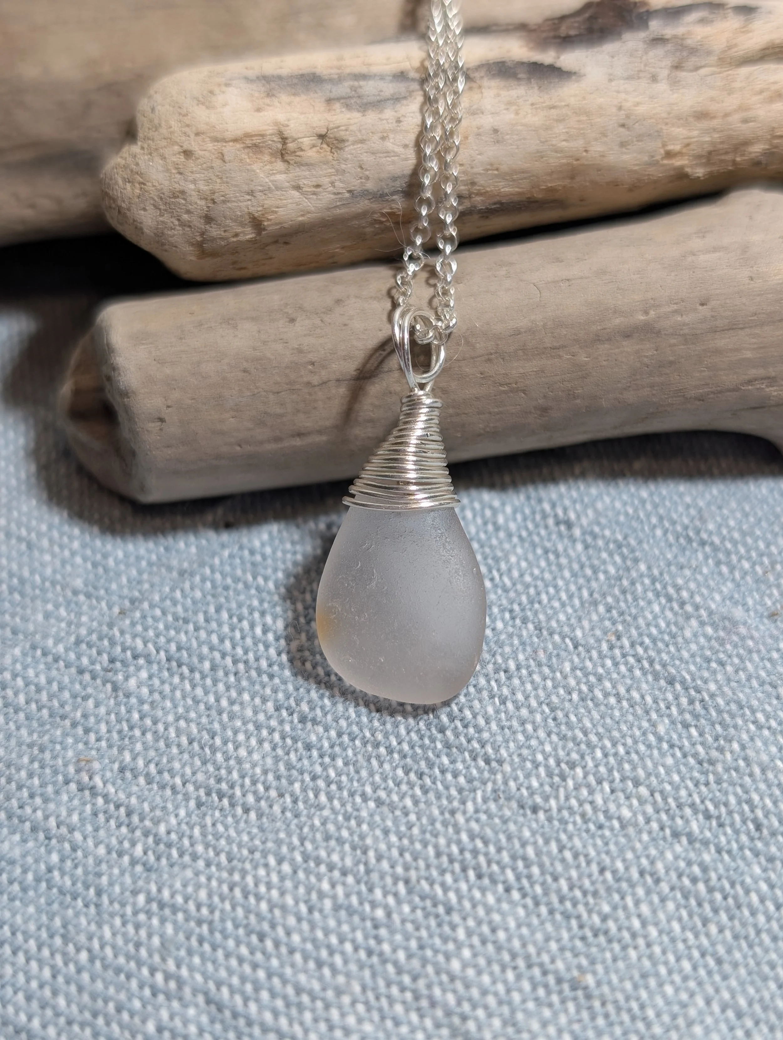 White-with-pink-hue-sea-glass-silver-wire-top-necklace (7).jpg