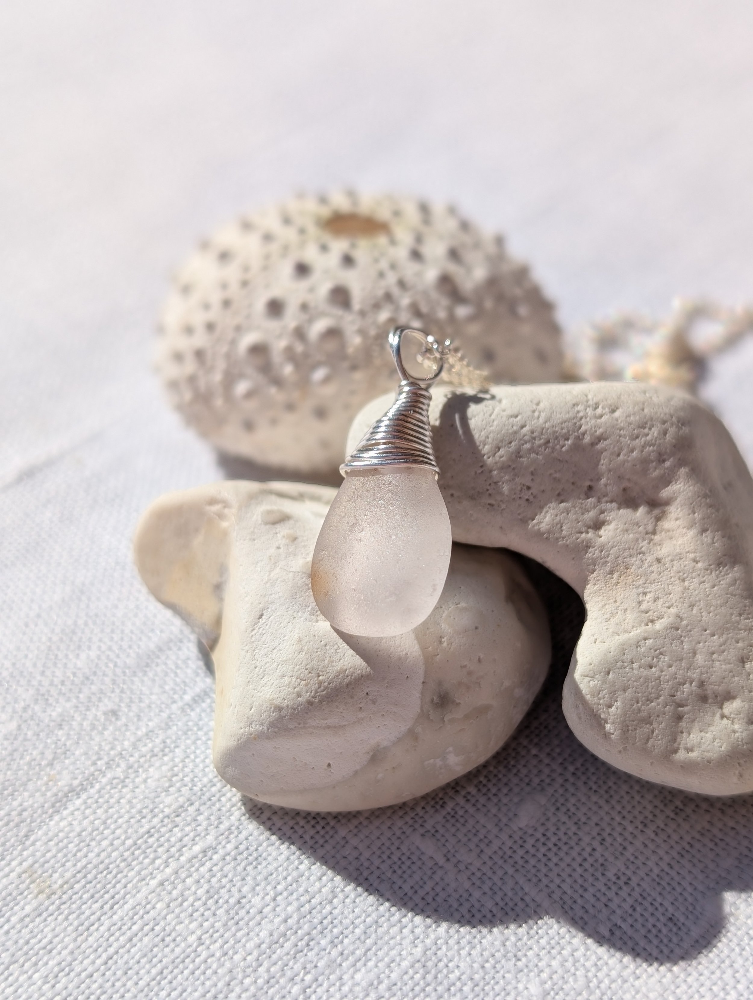 White-with-pink-hue-sea-glass-silver-wire-top-necklace (10).jpg