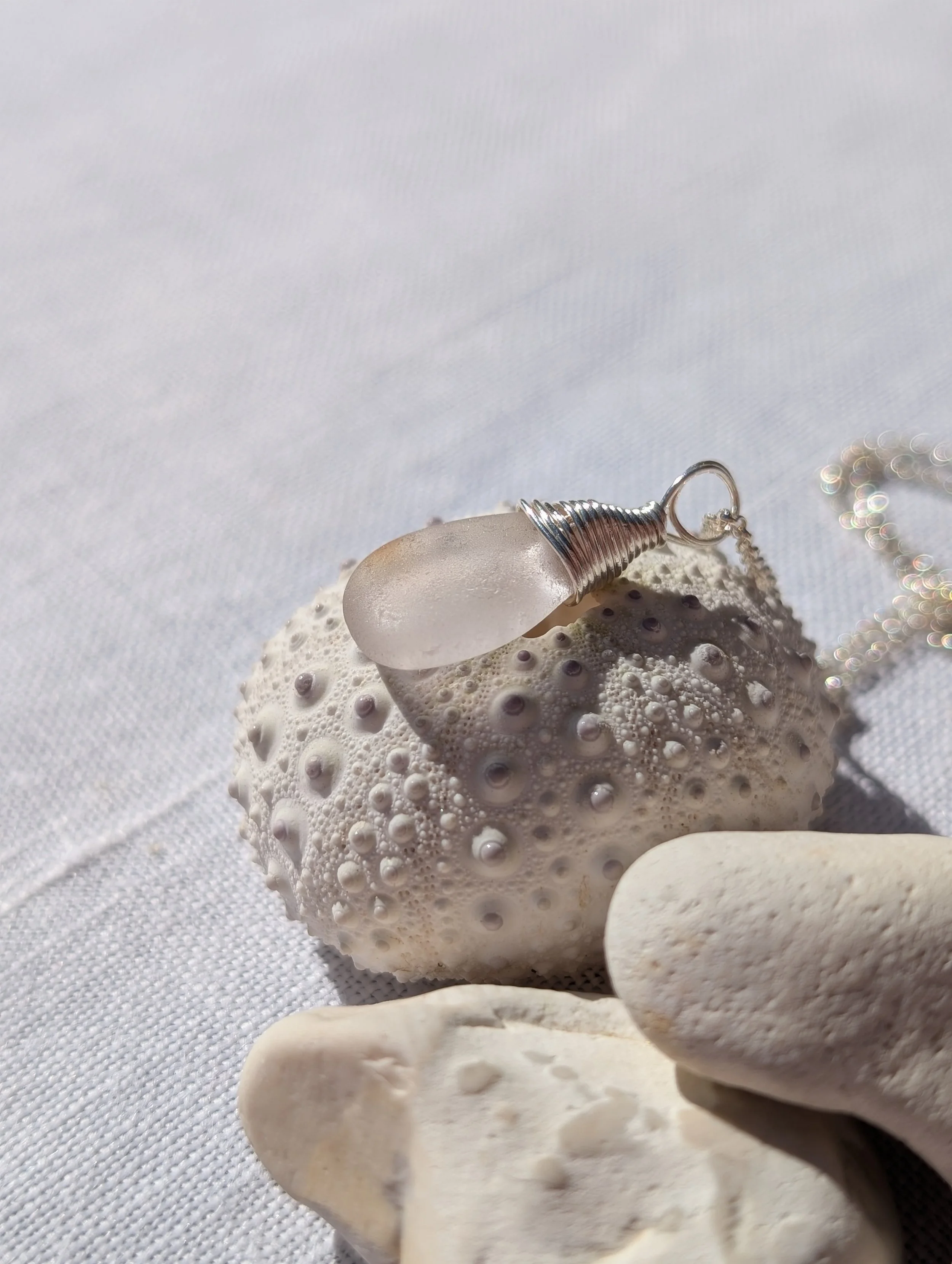 White-with-pink-hue-sea-glass-silver-wire-top-necklace (11).jpg