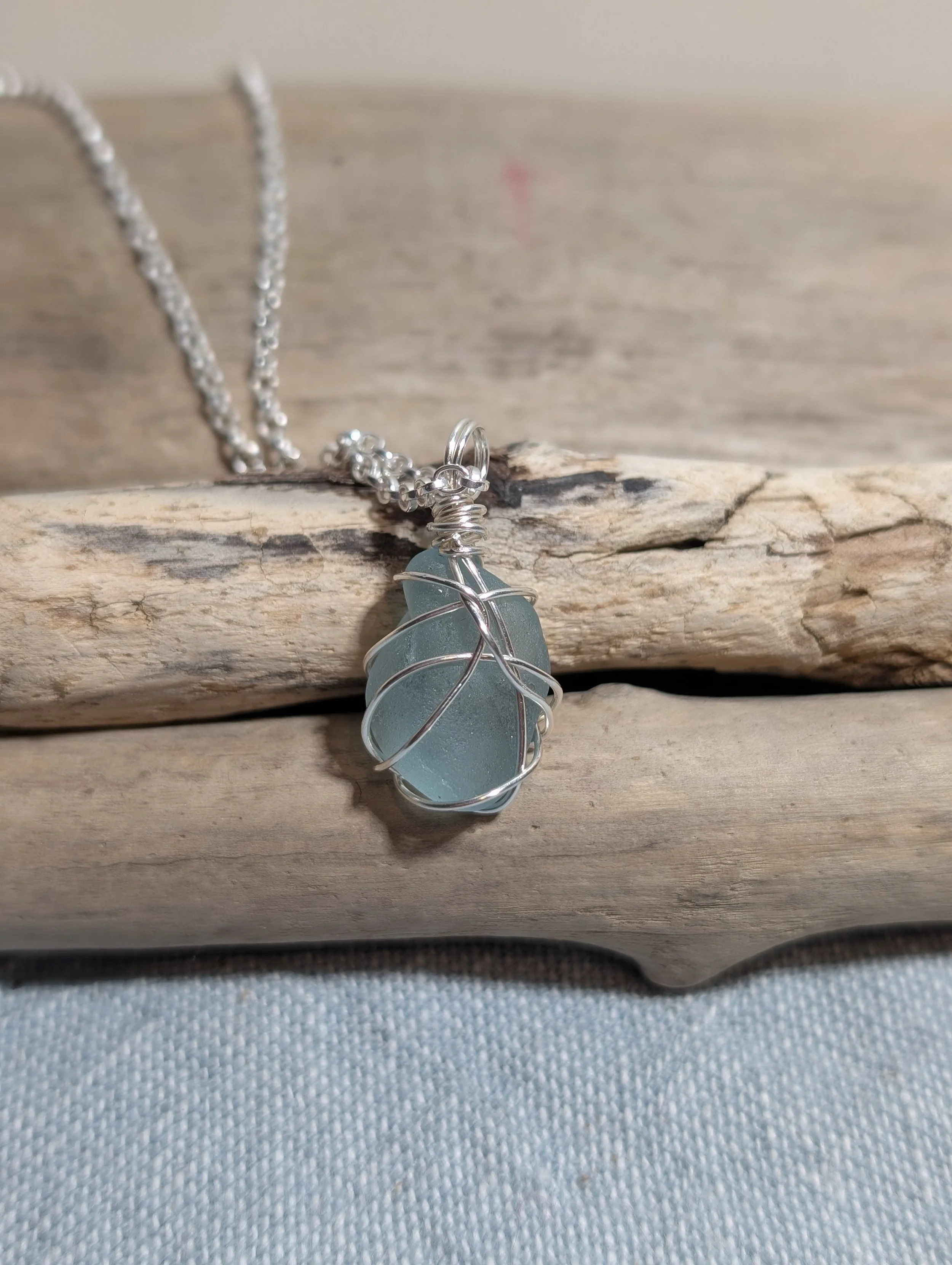 Steel-Blue-Sea-Glass-Fine-Silver-Wrap-Necklace.jpg