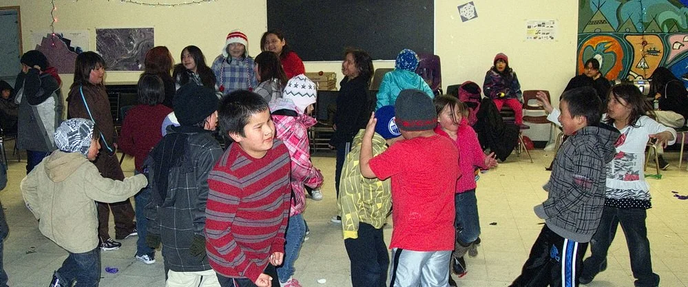 Indigenous children at a youth dance,.