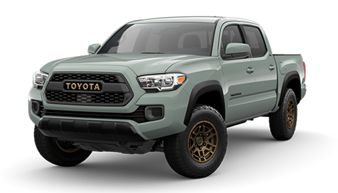 Light green Toyota Tacoma pickup truck with gold wheels, front grille with Toyota logo, and four doors.