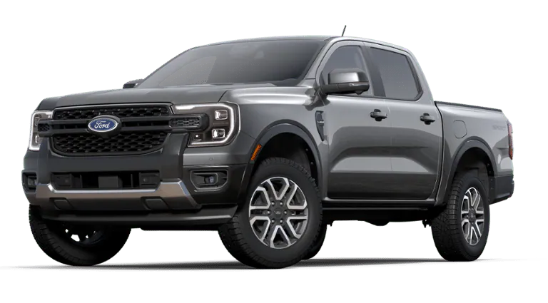 Gray Ford pickup truck viewed from the front and side, showing its grille, headlights, and four doors.