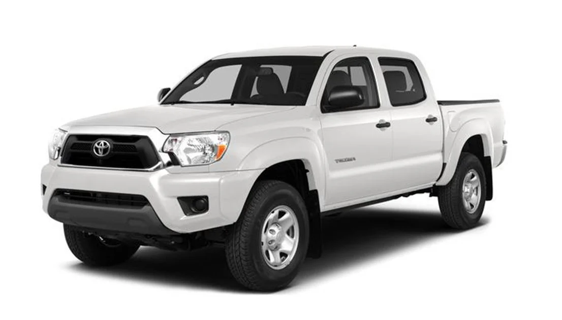 A white Toyota Tacoma pickup truck viewed from the front and side angles.