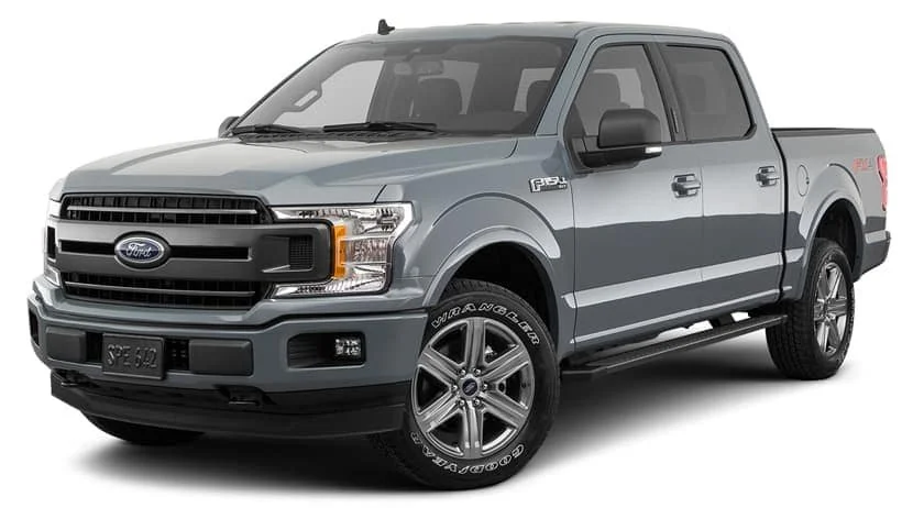 A silver Ford F-150 pickup truck with four doors and alloy wheels.