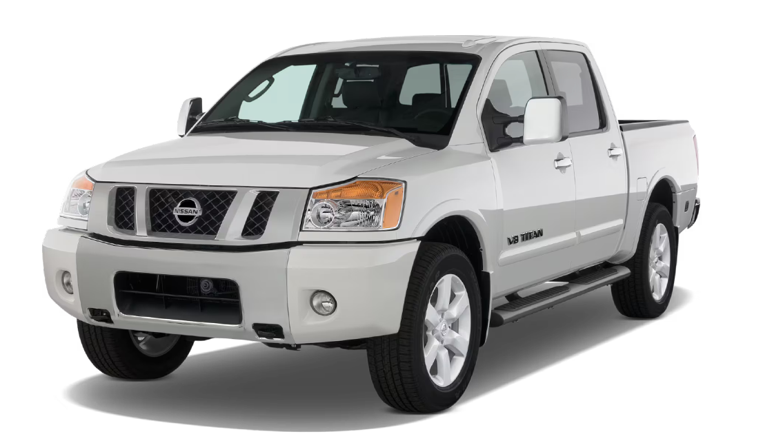 White Nissan Titan V8 pickup truck with four doors, chrome side mirrors, and running boards