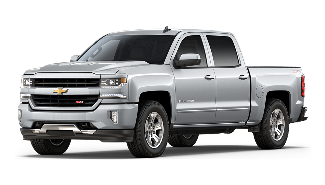 Silver Chevrolet Silverado Z71 pickup truck viewed from the side against a black background.