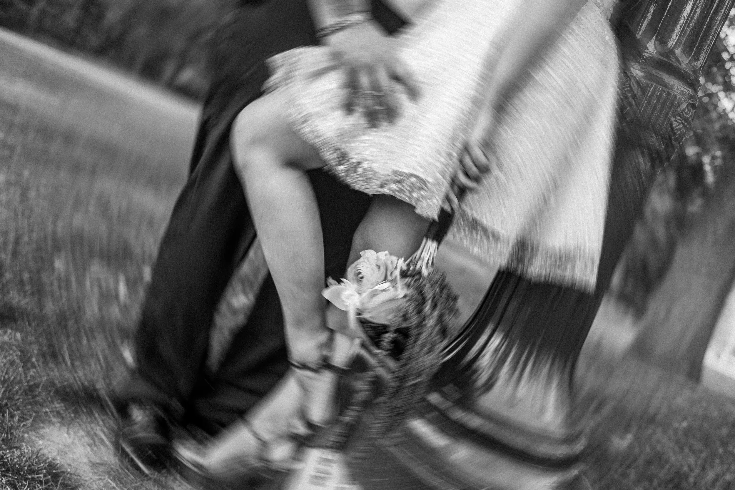 A person holding a bouquet of flowers.