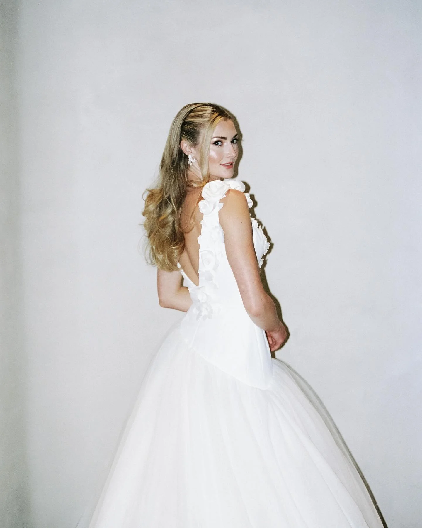 Lana in @viktorandrolfmariage &mdash; a very blissed out bride 🤍

And a note on bridal portraits: we had a solid 20 mins (a century in wedding time) to have fun &amp; get creative with Lana&rsquo;s bridals. To be so candid, we were able to do this b