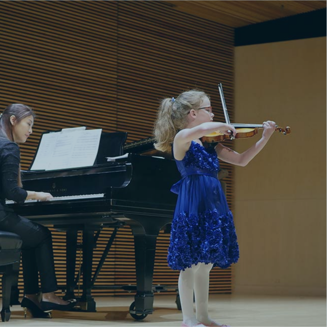 Student of Elizabeth MacCorquodale playing violin for the spring recital