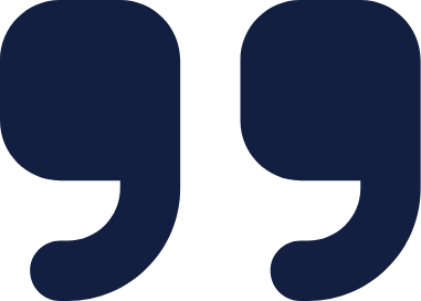 Two large navy blue quotation marks on a white background.