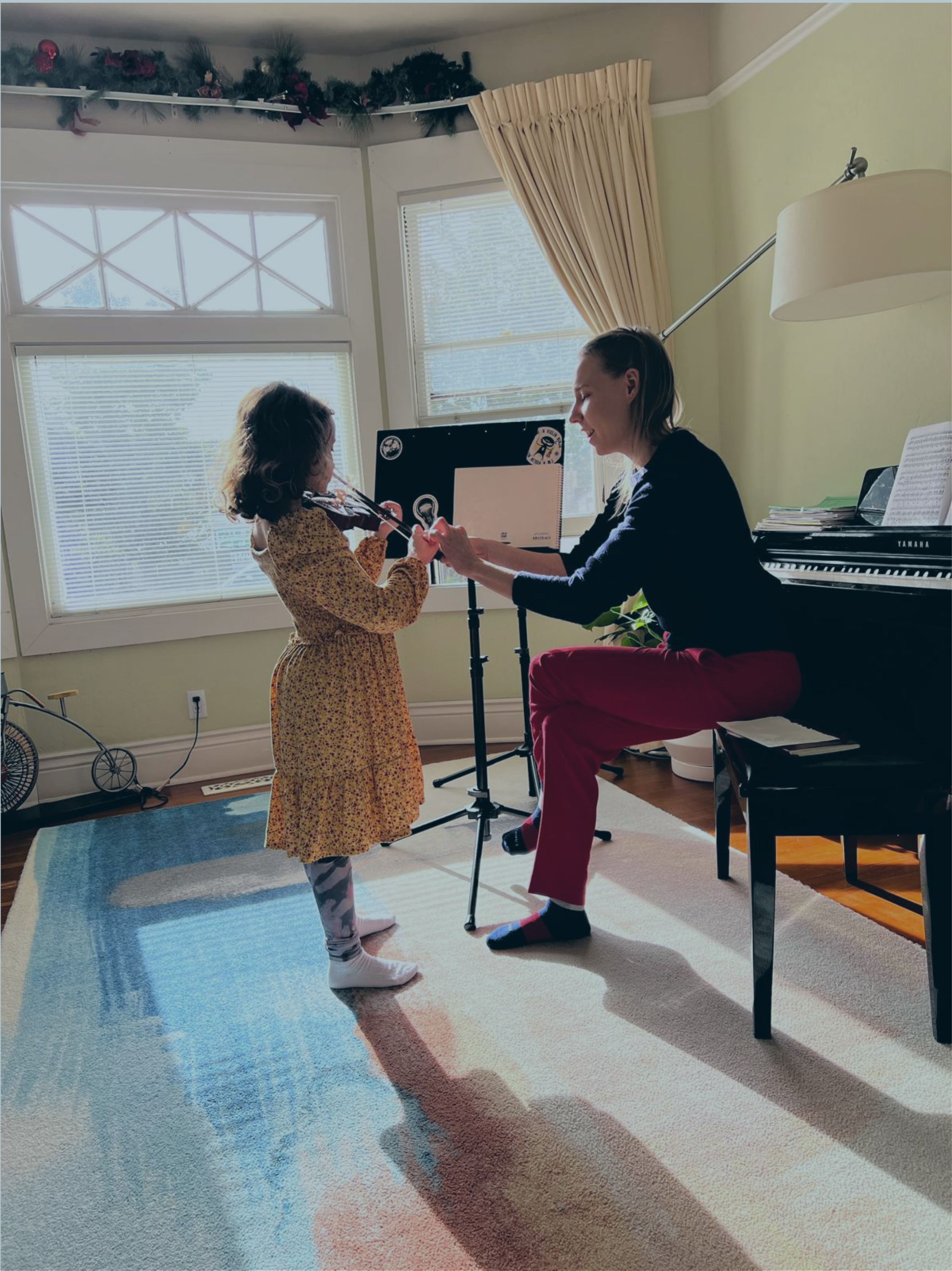 Elizabeth MacCorquodale teaching in music studio
