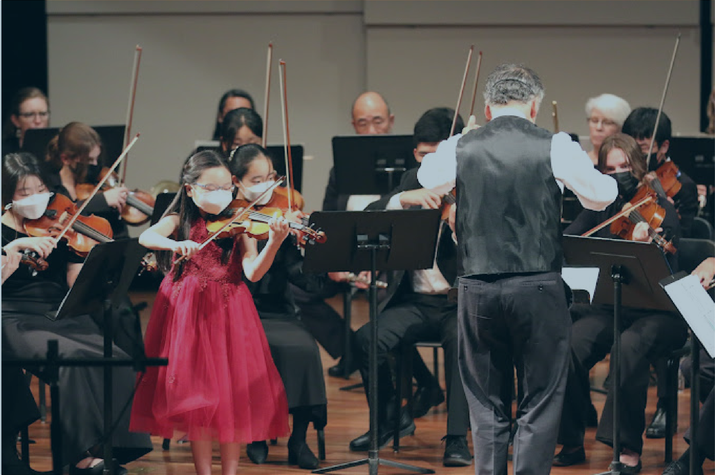 Elizabeth MacCorquodale students performing violin