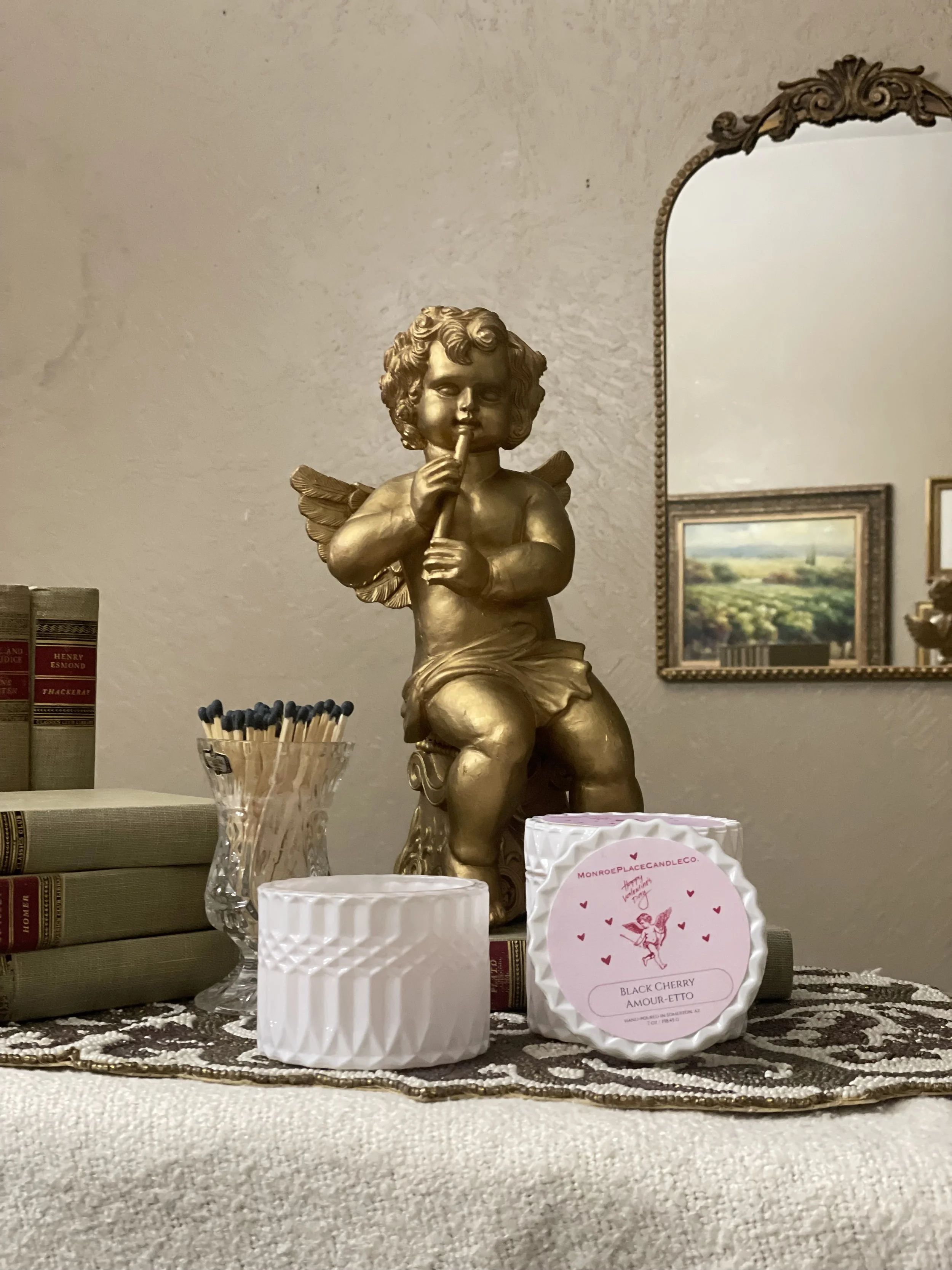 cherub valentines day black cherry candle in white vessel
