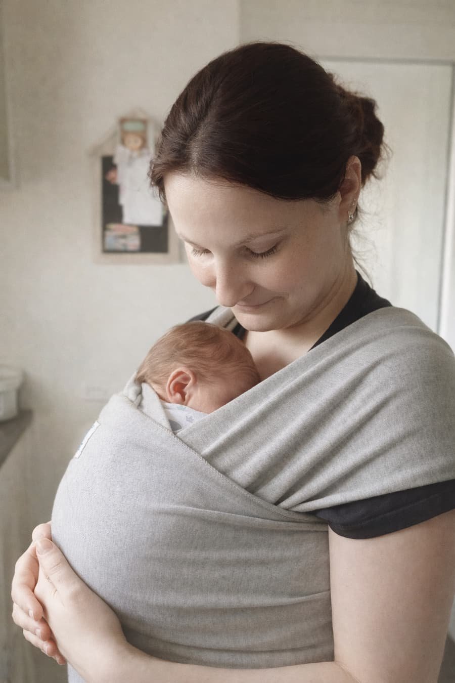 Aleksandra Balazy-Knas Perinatal CBT Therapist holding her newborn baby