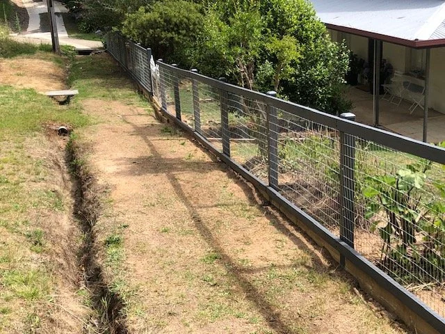 timber and square mesh fence.jpg