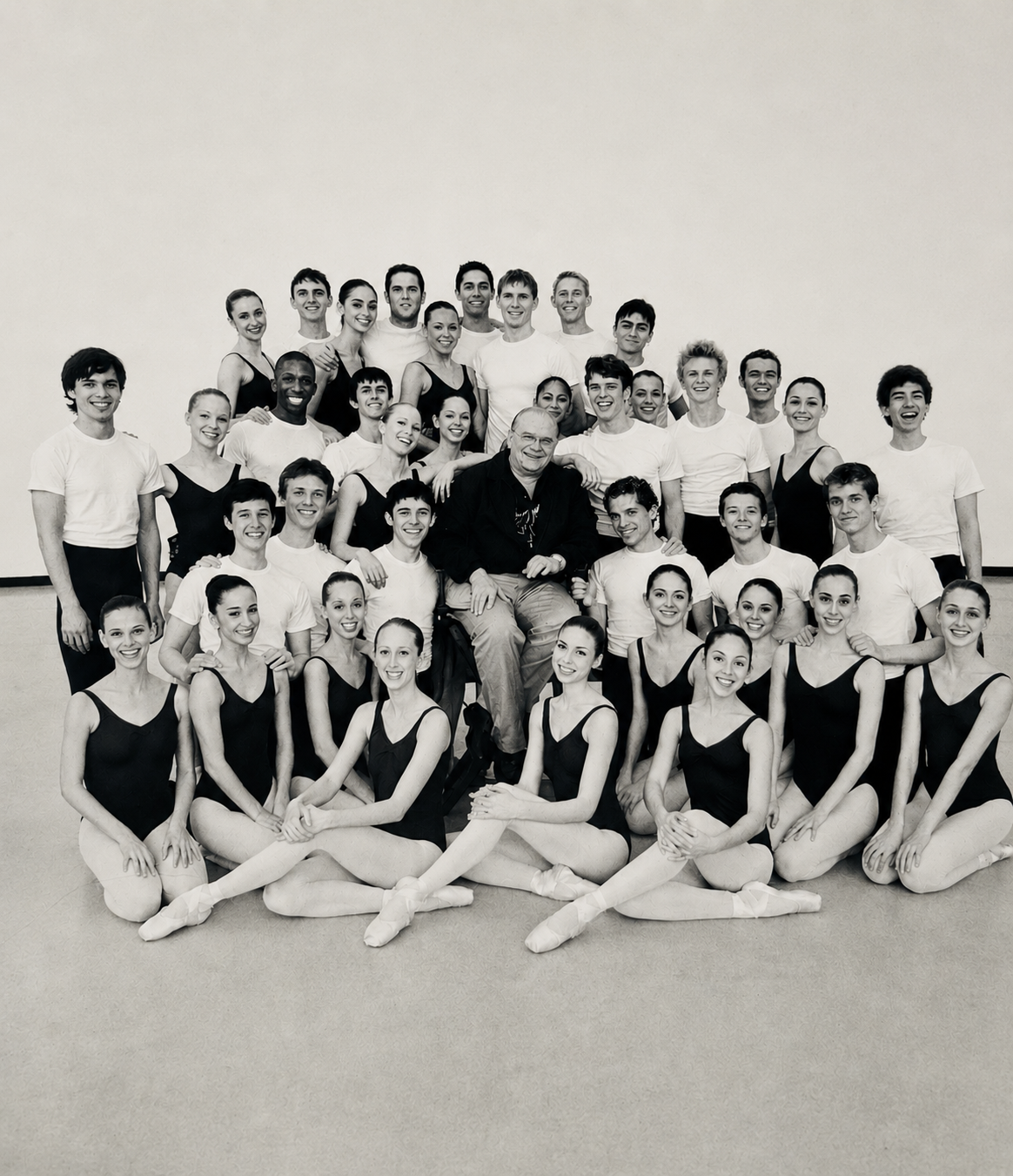Ben Stevenson surrounded by ballet students