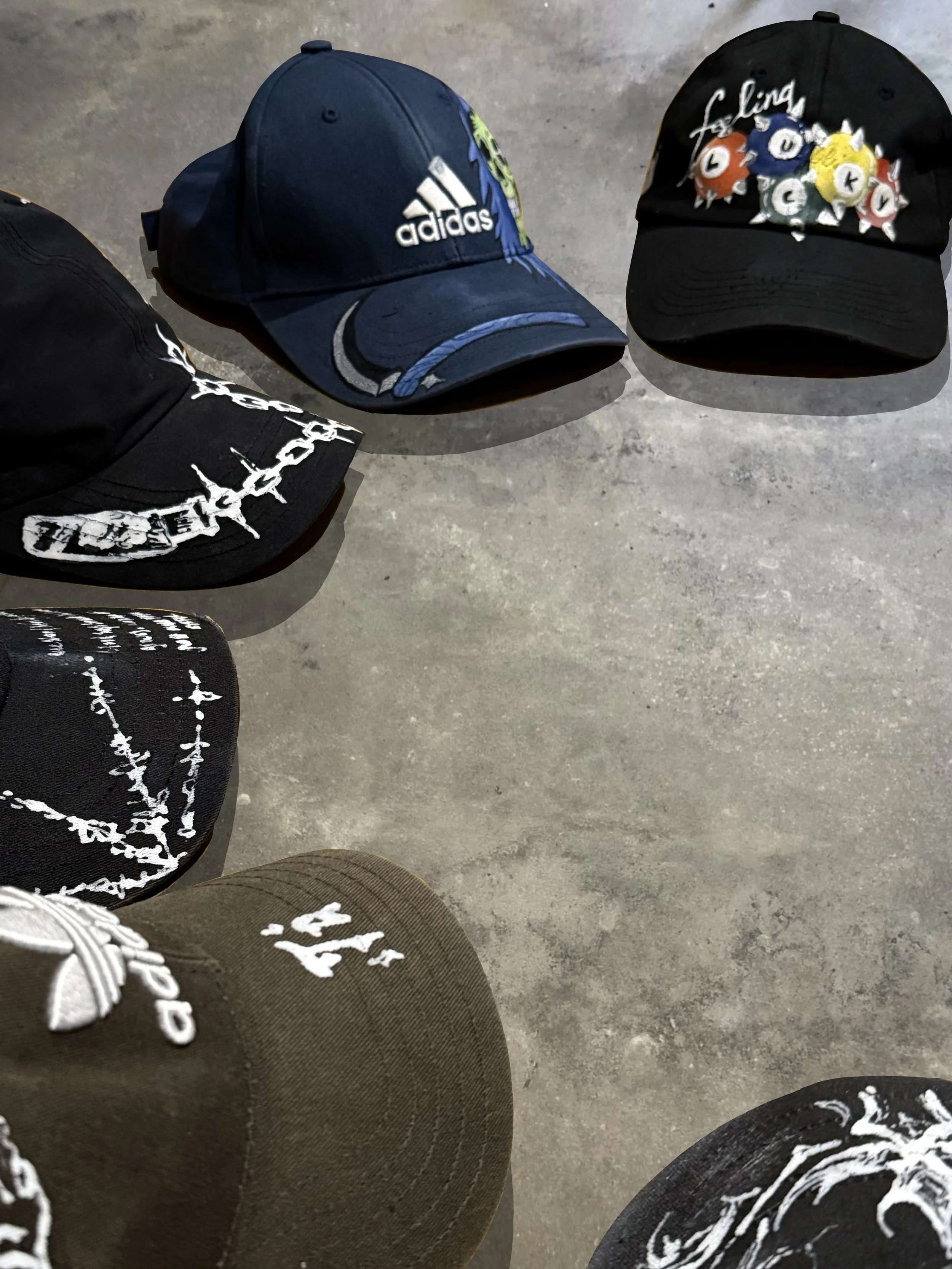 A collection of painted caps