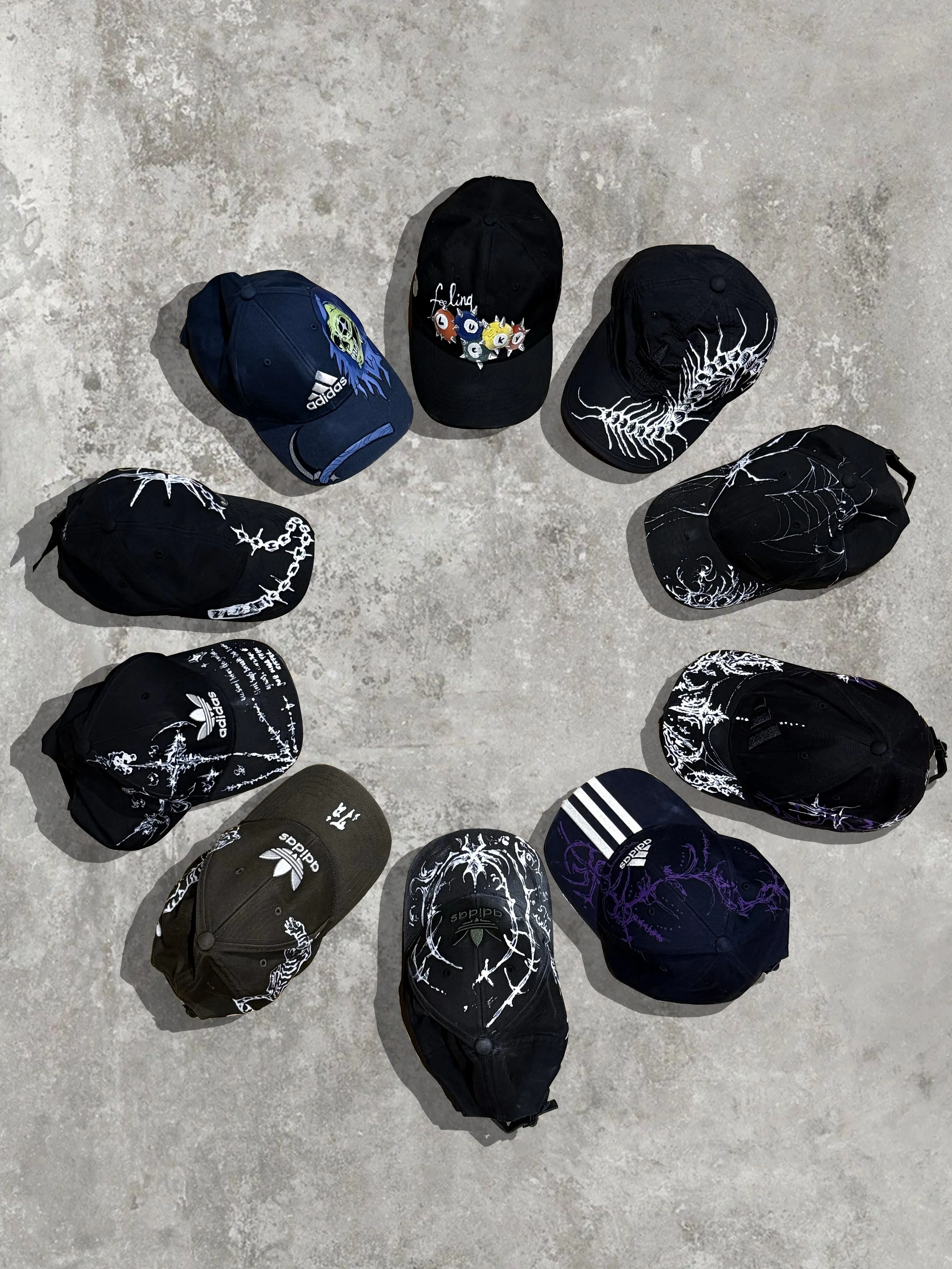 A collection of painted caps 