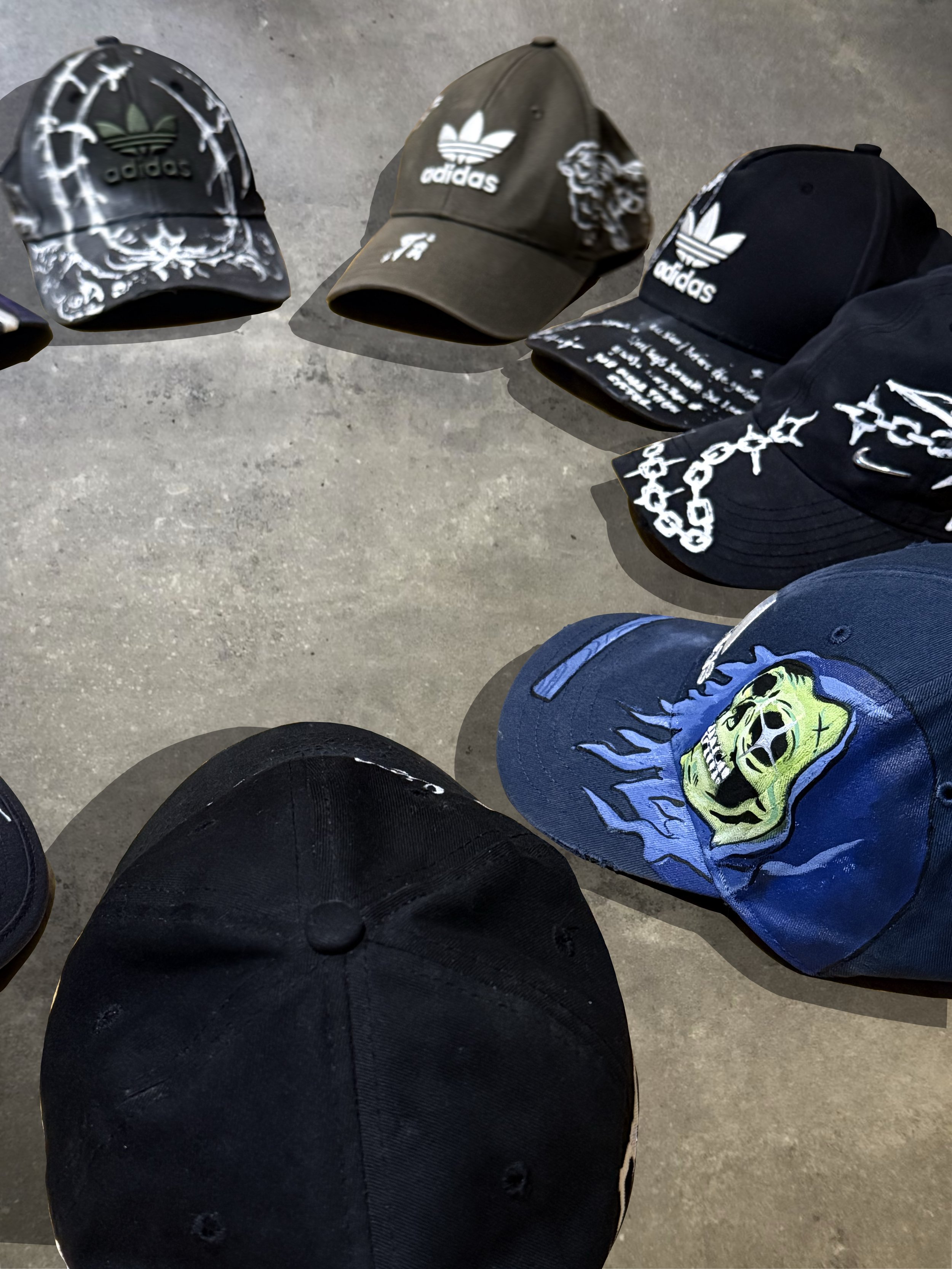 A collection of painted caps 