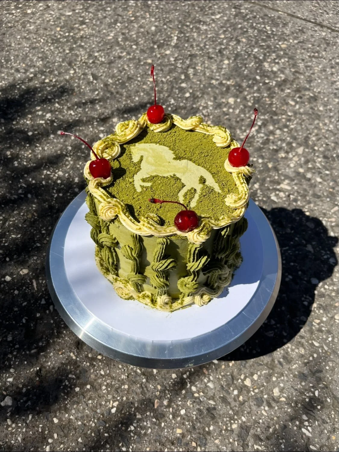 Horse cake for a 30th!! Chocolate sour cream cake with passionfruit curd and a matcha cream cheese buttercream. I made this flavour for my 30th birthday cake a few years ago, it&rsquo;s my absolute favourite flavour combo.