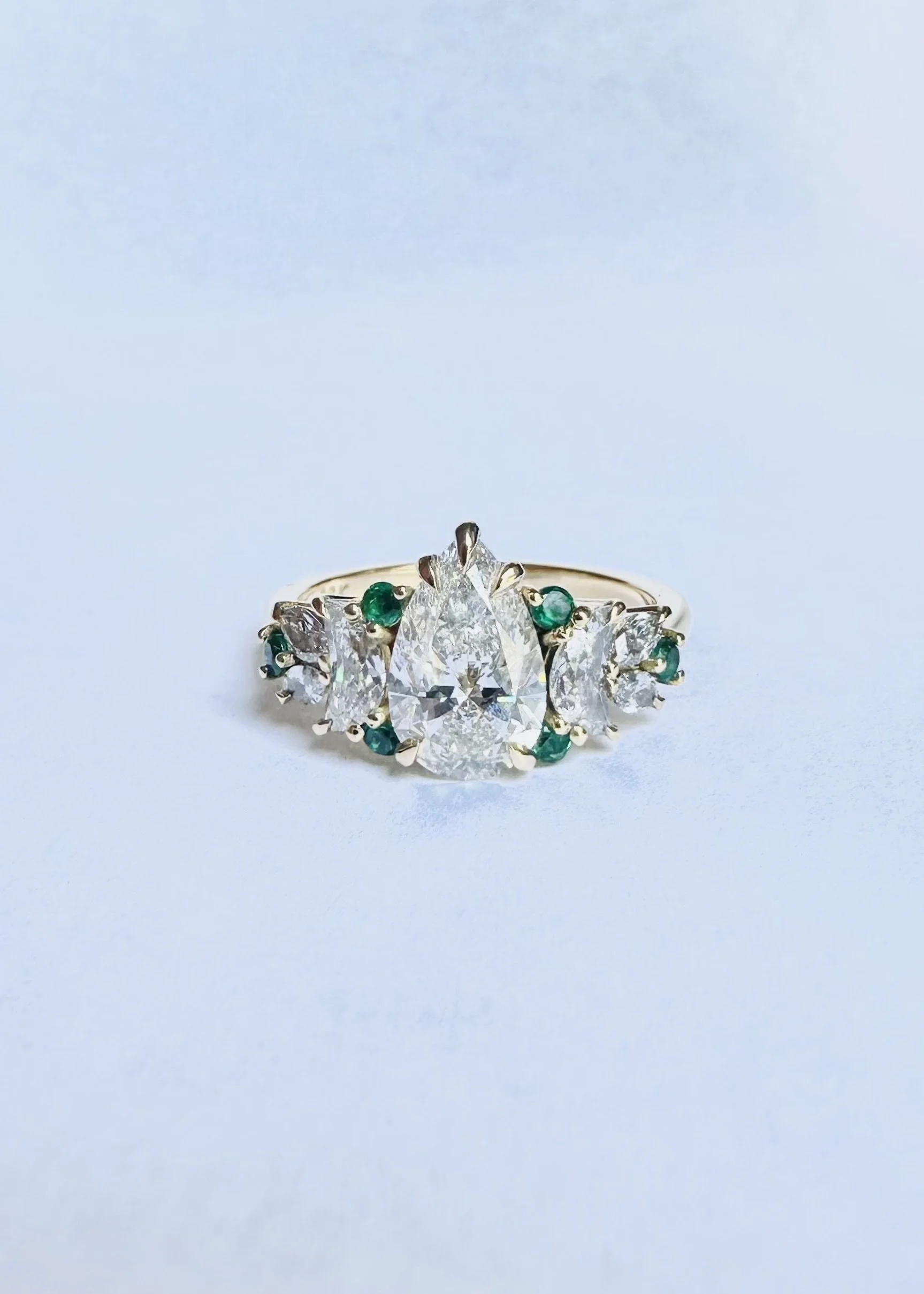 oval-diamond-emerald-cluster-engagement-ring-white-gold-gallery-helen-minor2