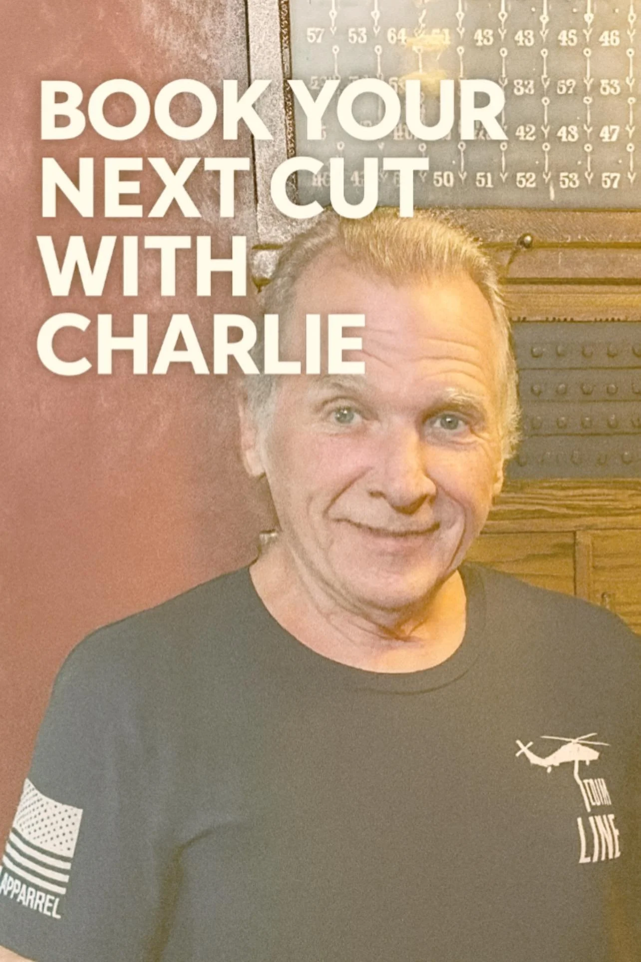 Poster featuring a man smiling, with large text overlay reading "Book your next cut with Charlie," and a helicopter logo with the words "Eye Line" on his black T-shirt.