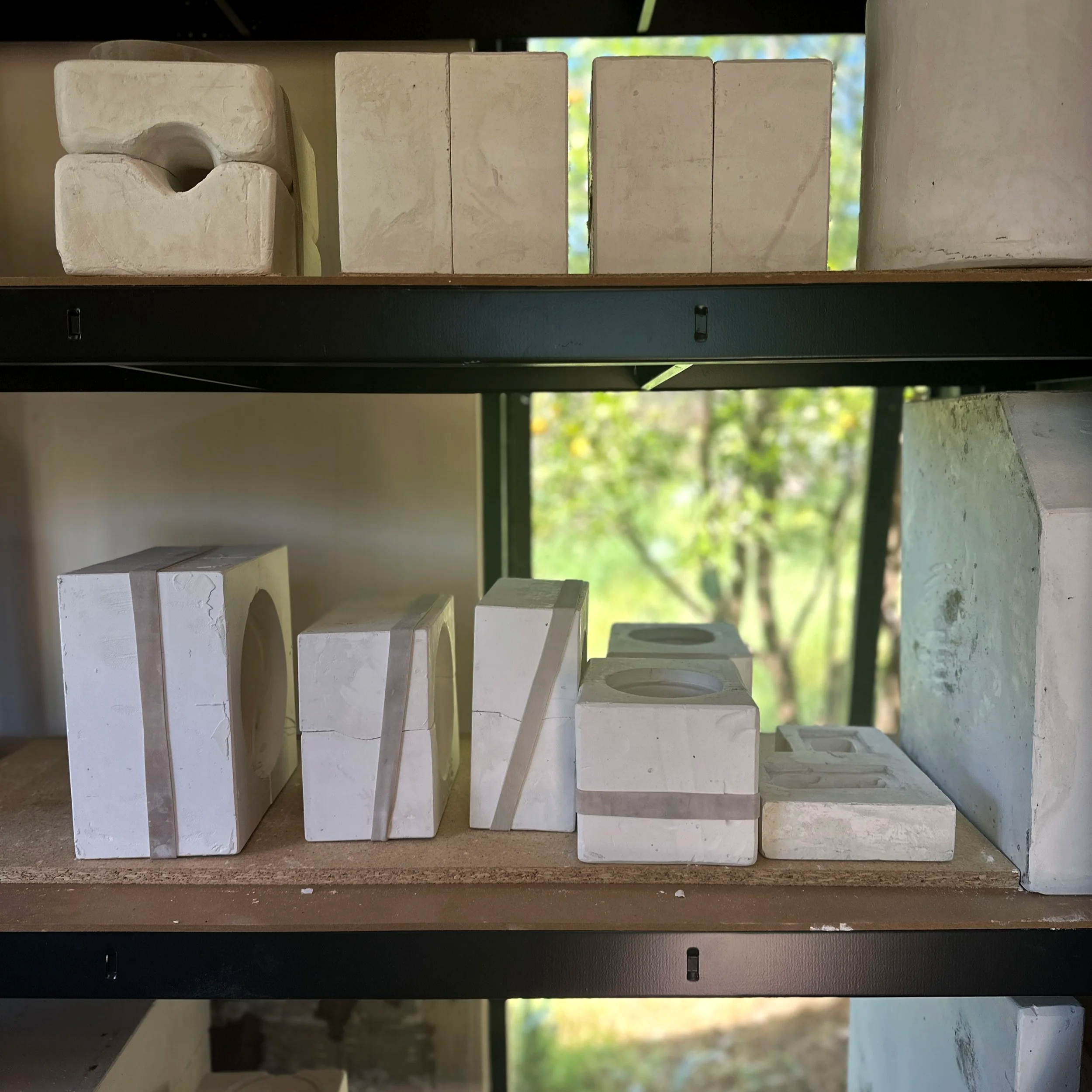 slip casting moulds on a shelf in the Adelaide studio