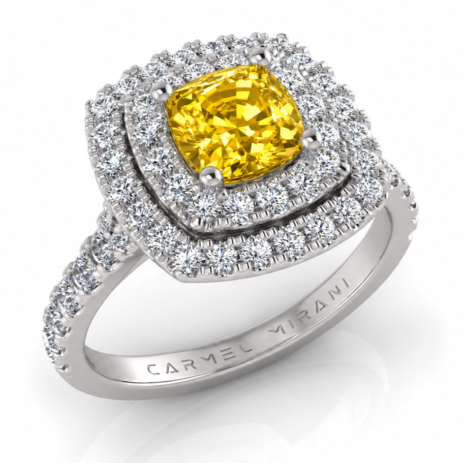 A silver ring with a large yellow gemstone surrounded by small clear diamonds.