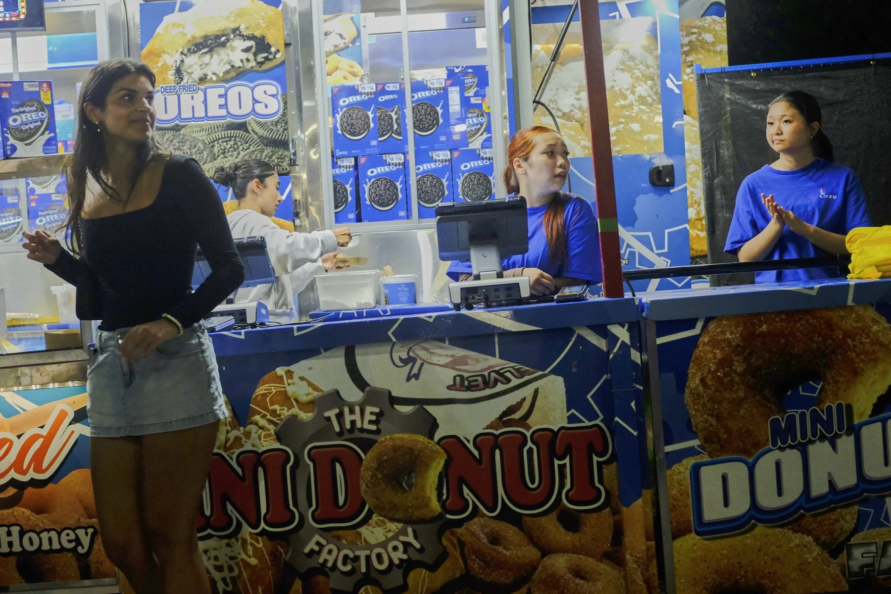 9 donut vendors and patron.jpg