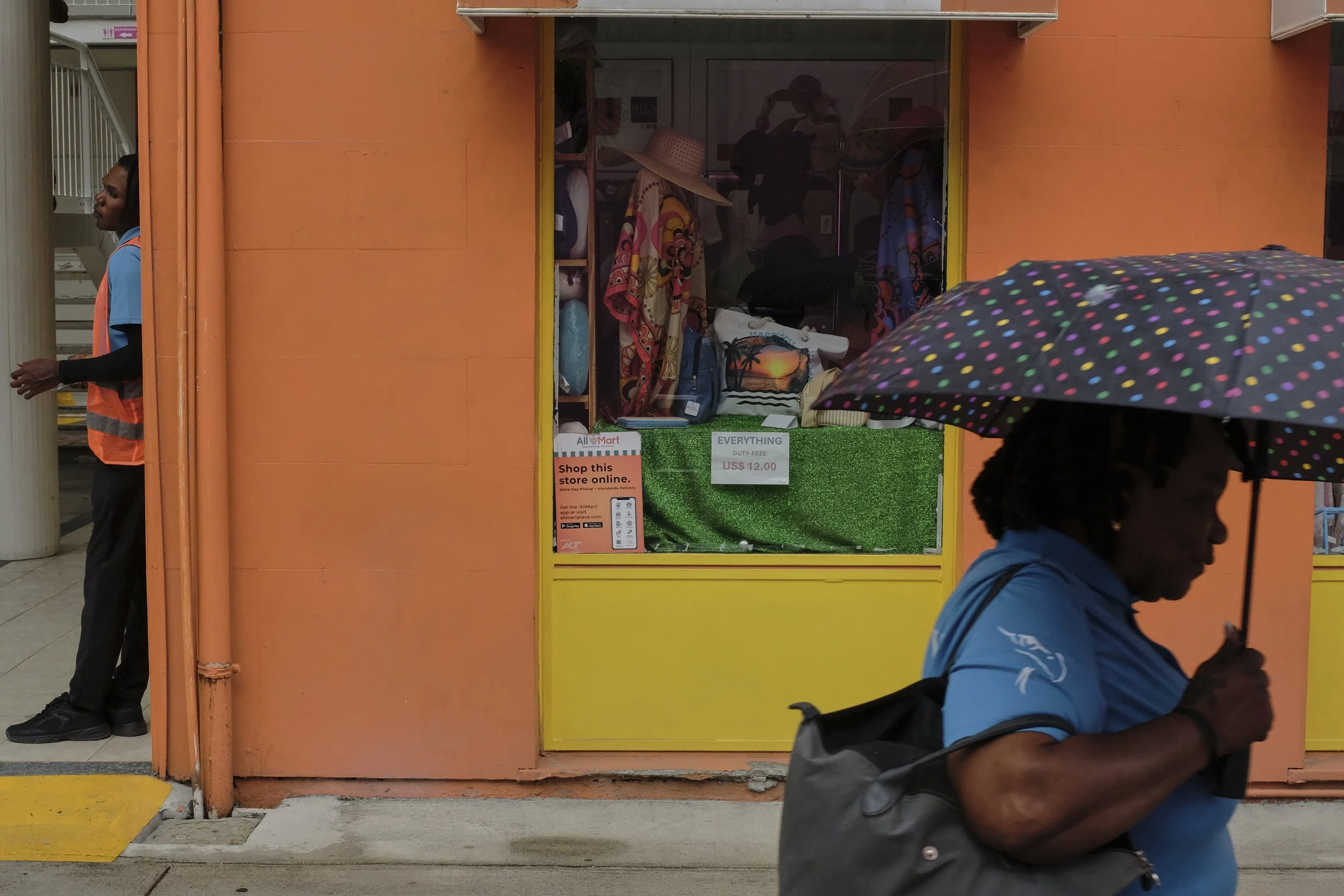 security guard and umbrella pedestrian.jpg