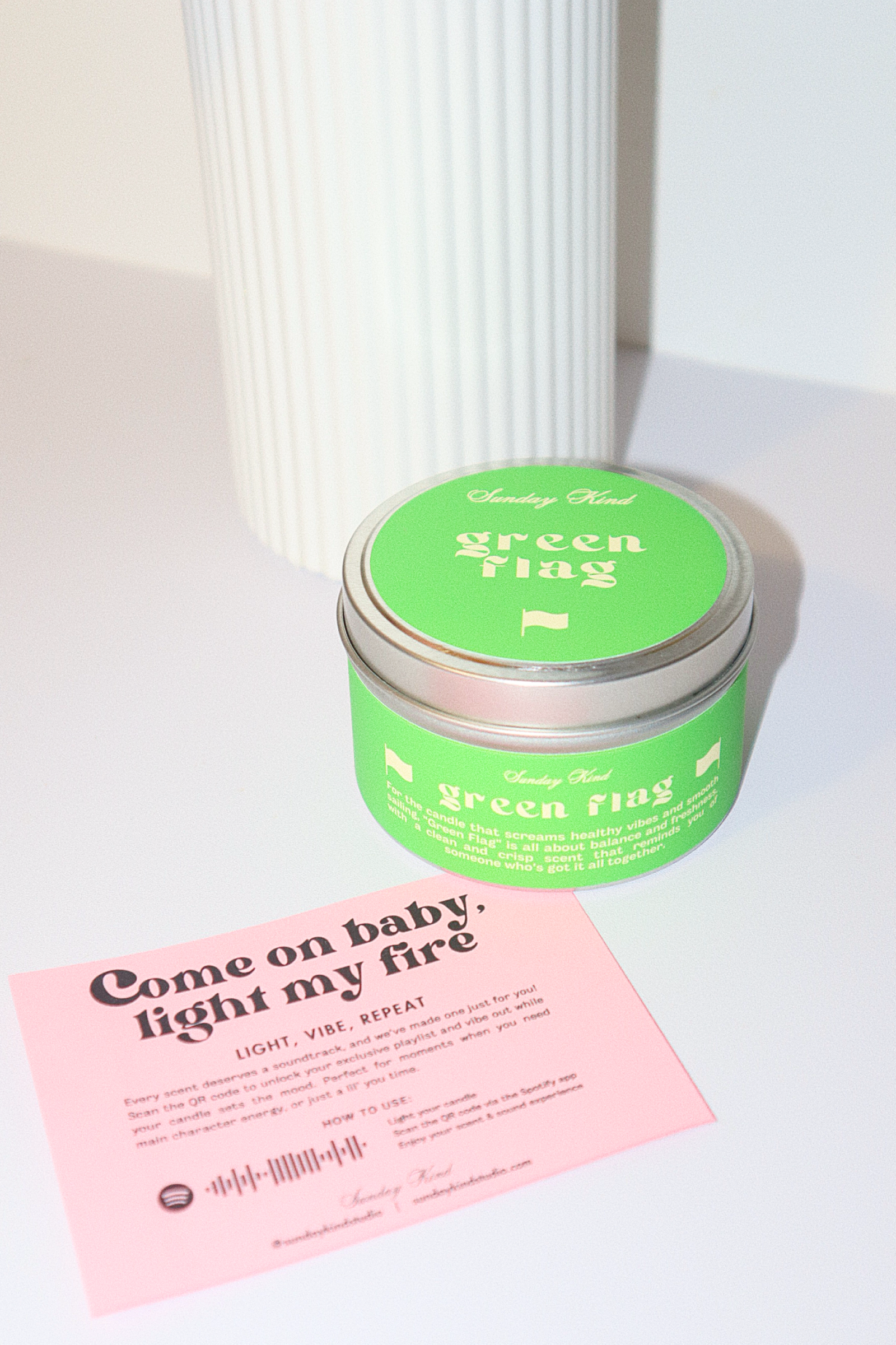 green flag scented tin candle