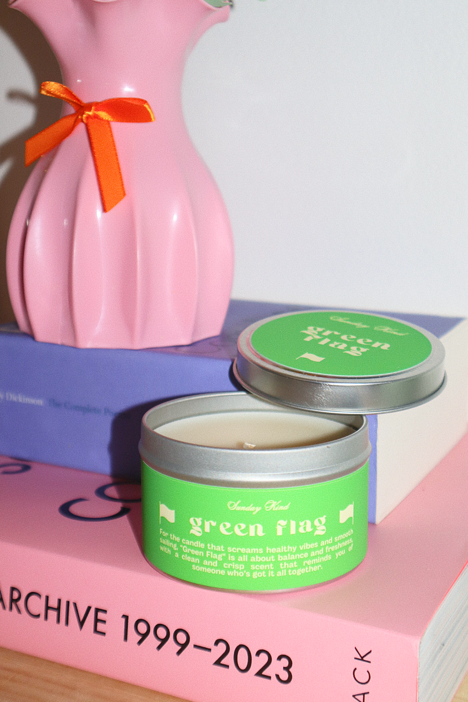 green flag scented tin candle