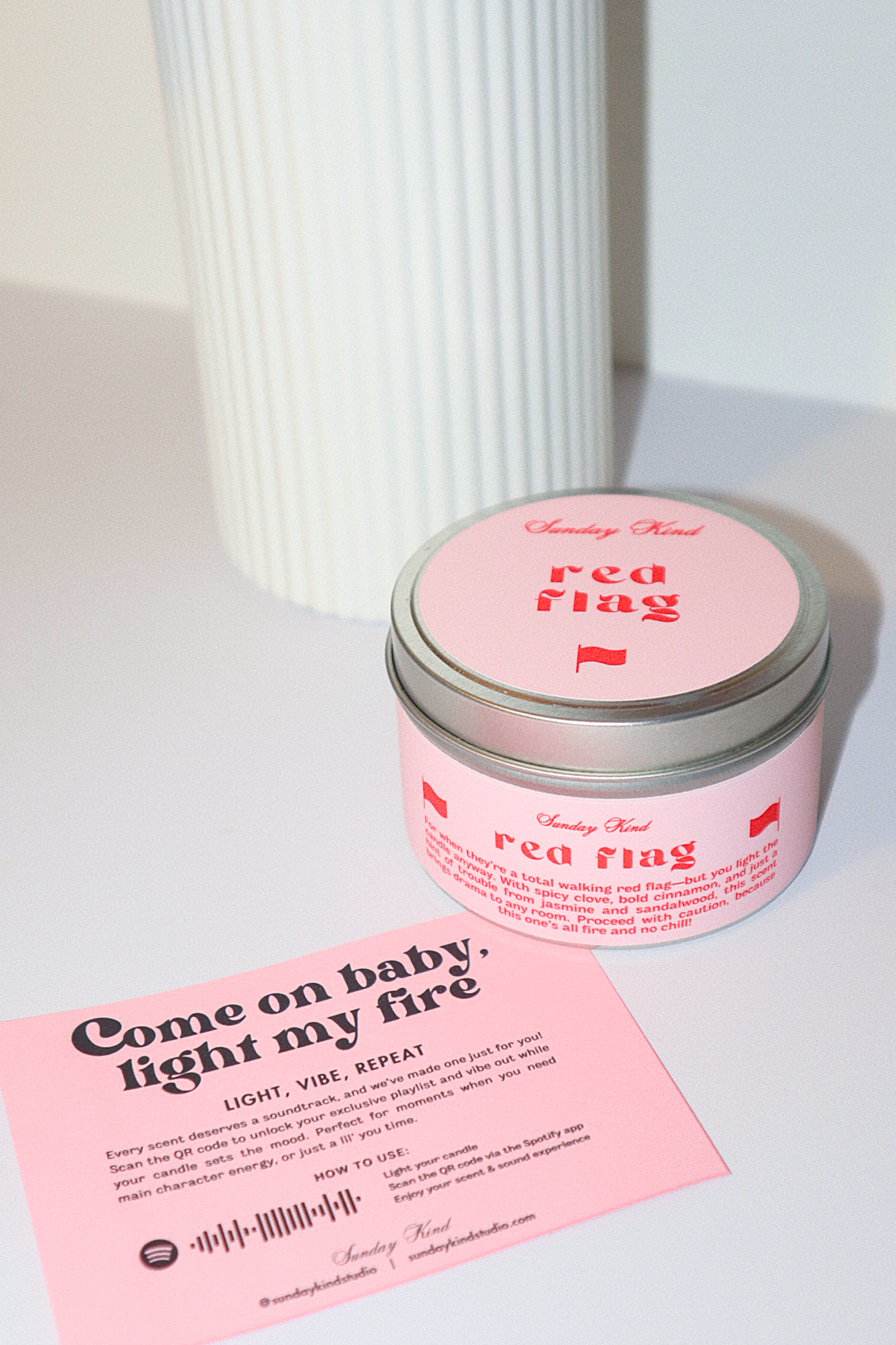 red flag scented tin candle