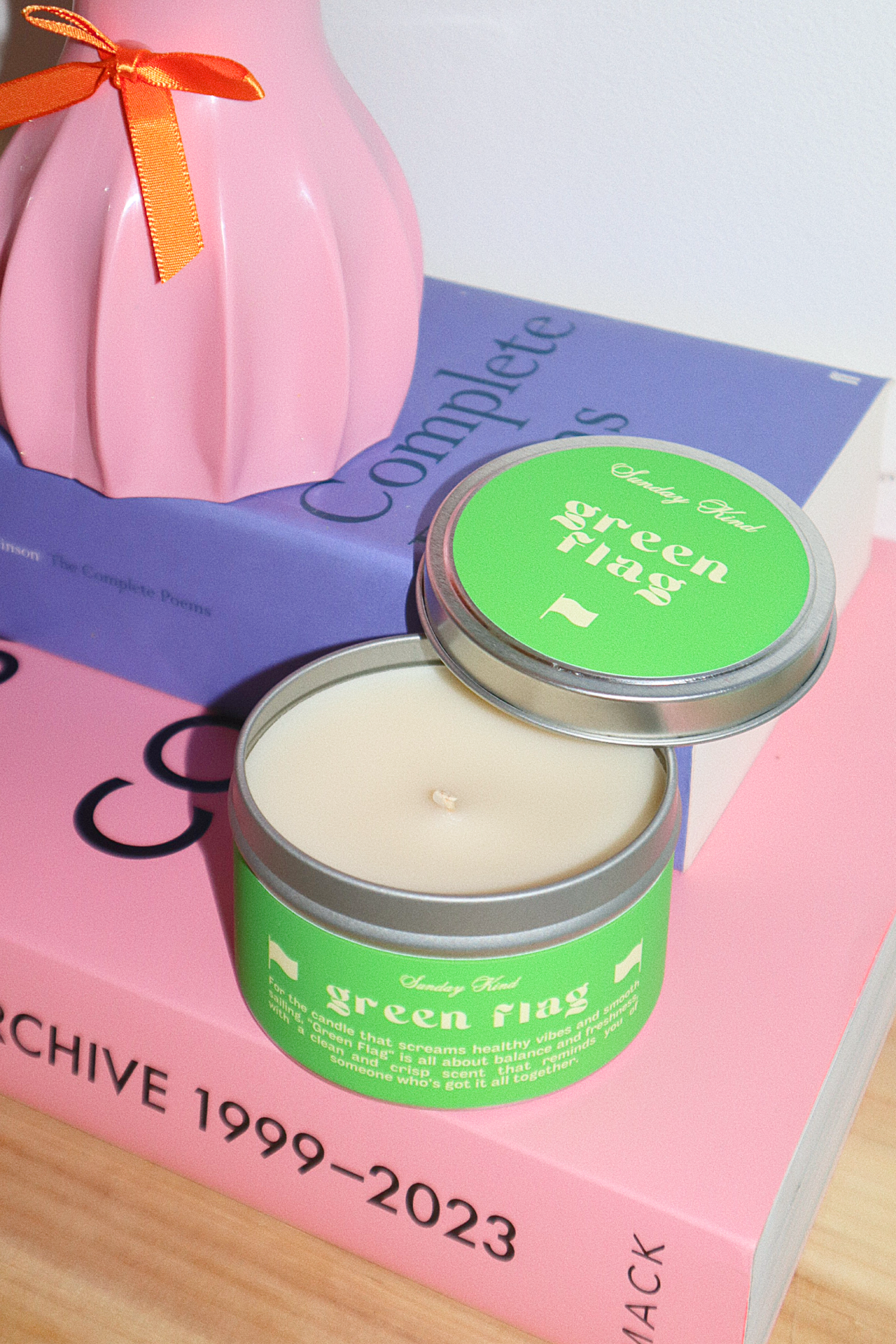green flag scented tin candle