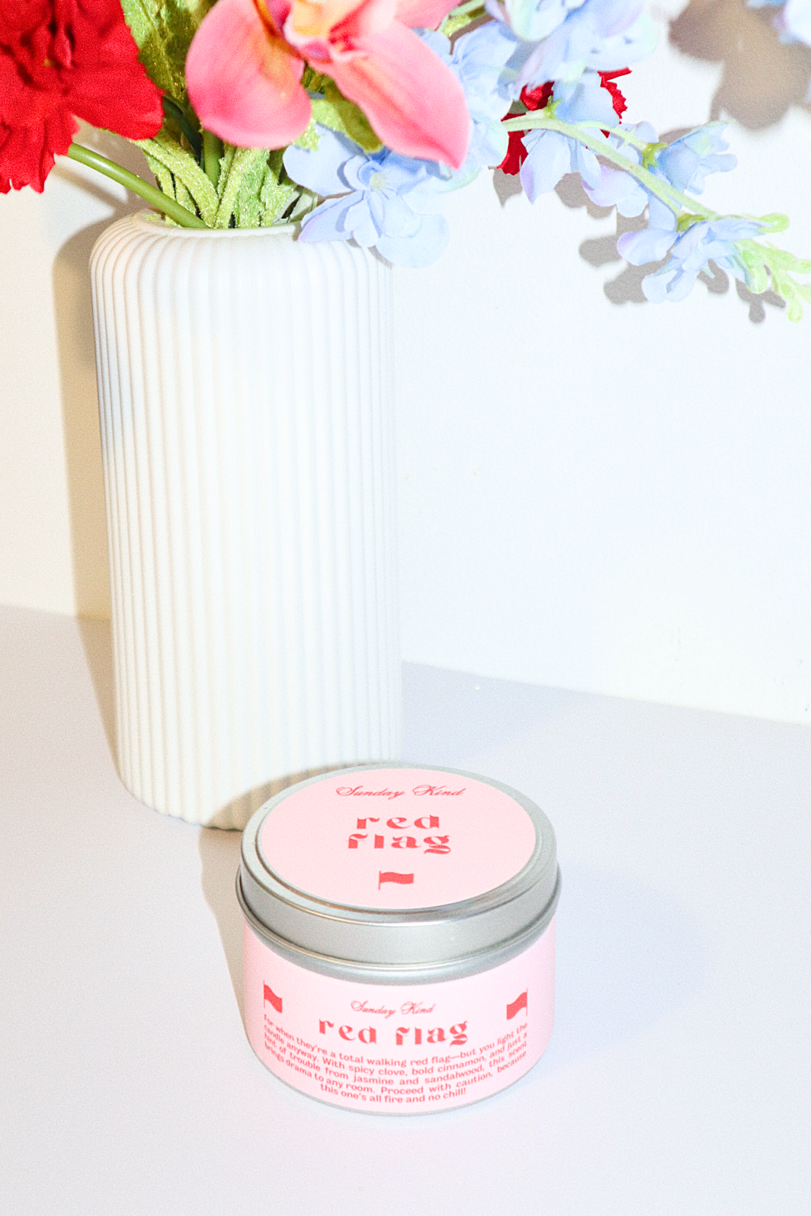 red flag scented tin candle