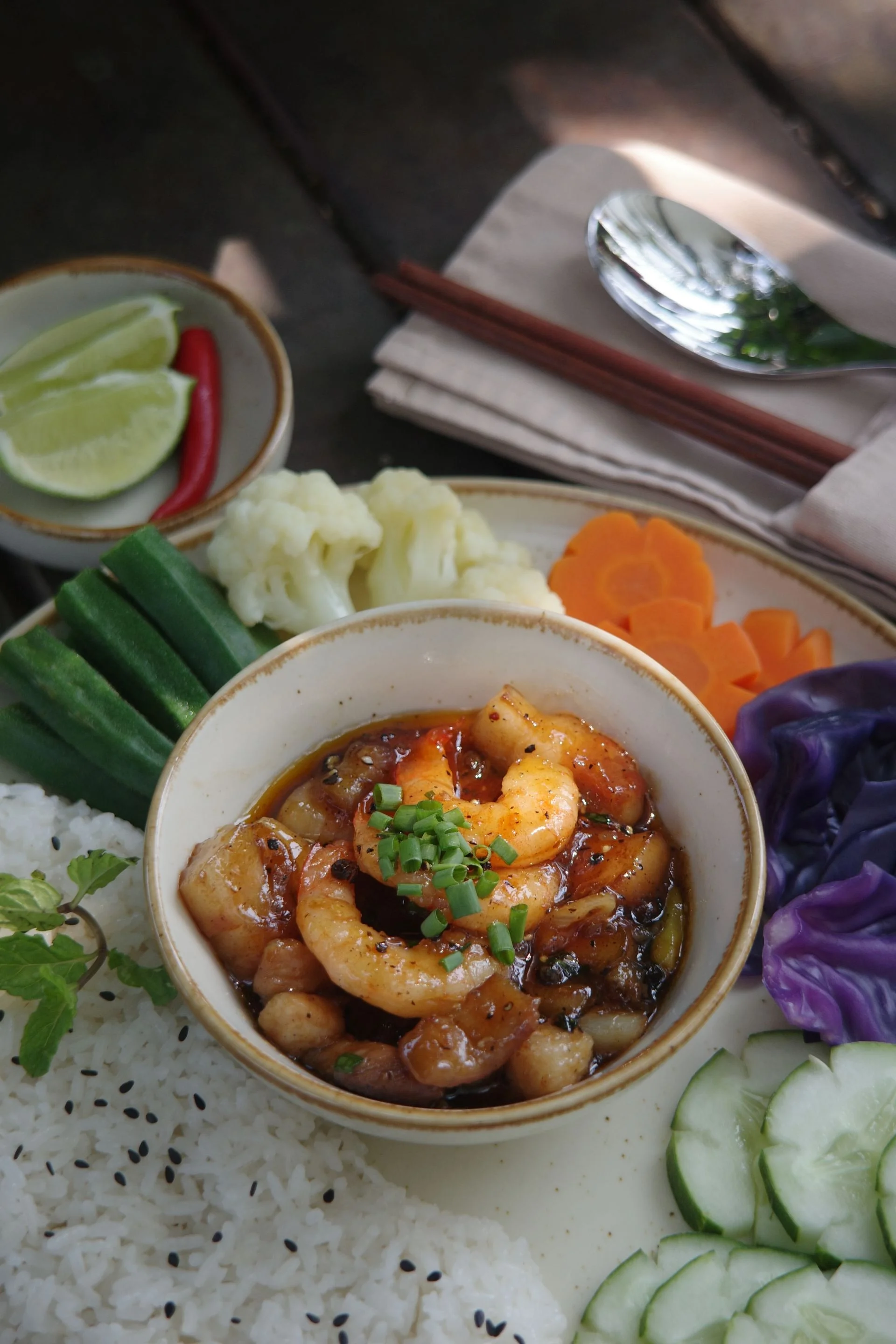 Kho Quet with shrimp pork cracklings, rice and steamed vegetables