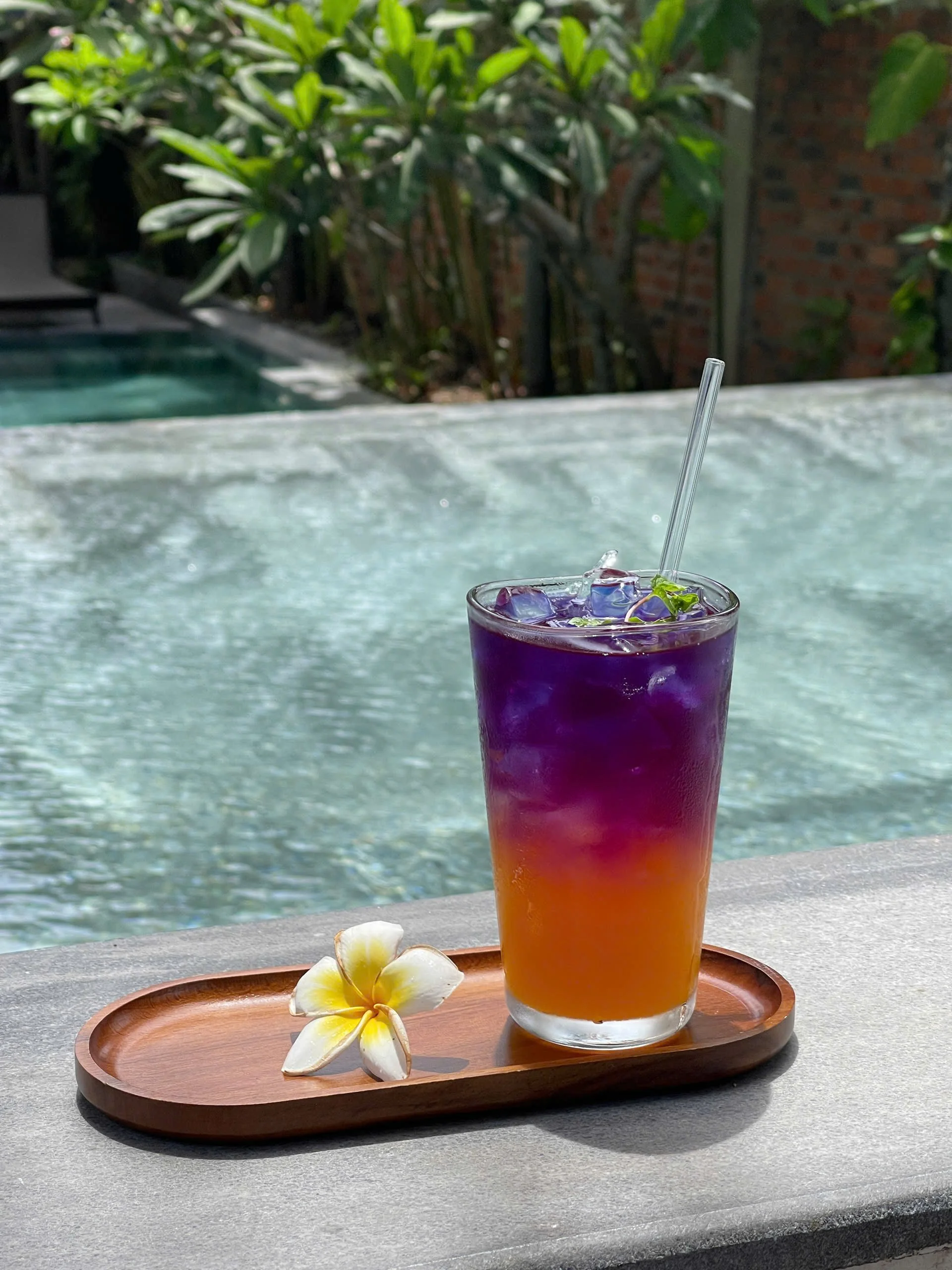 The Interlude signature drink Tra Que Twilight by the pool