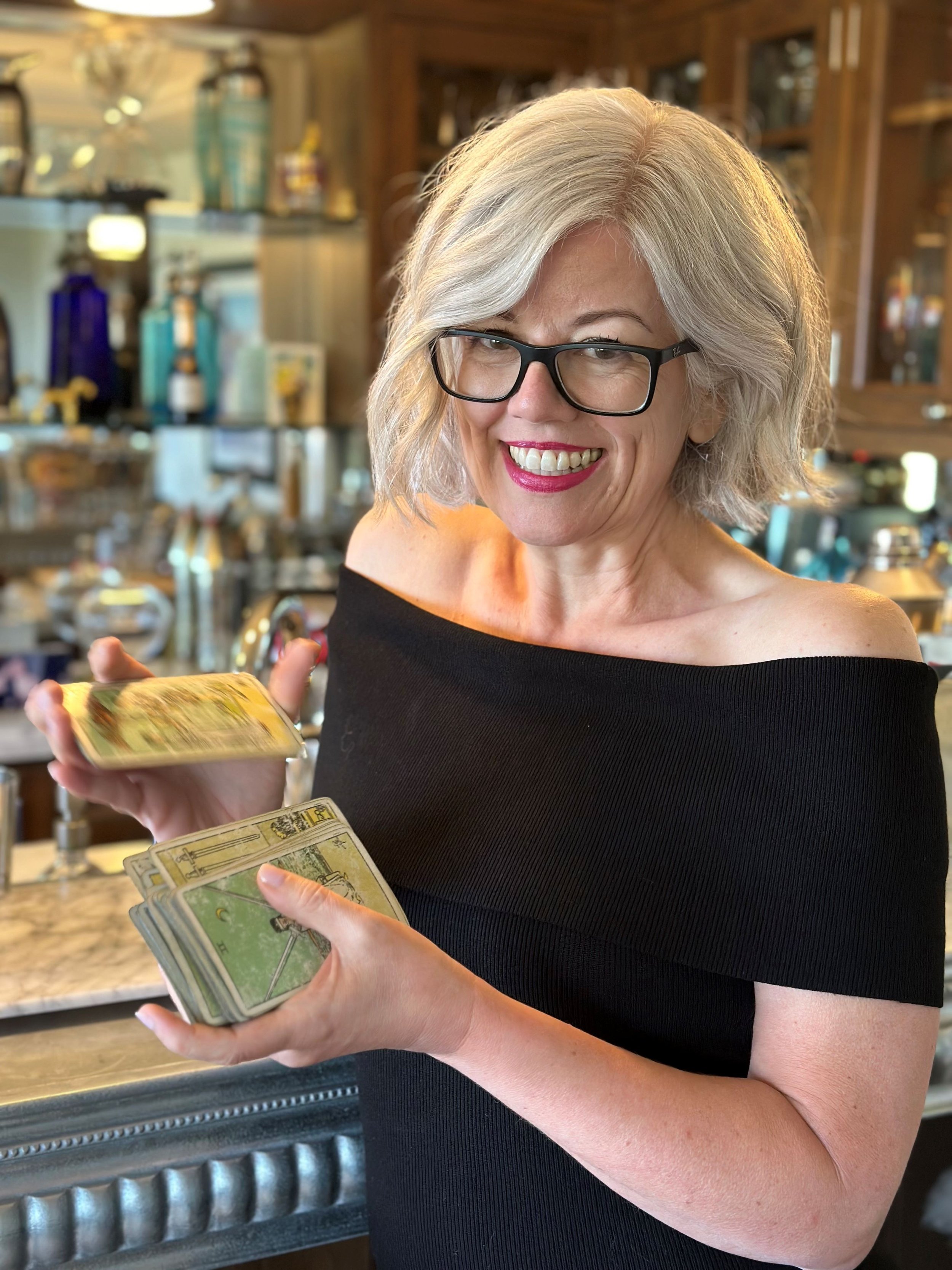 Lori Dyan reading tarot at a private event