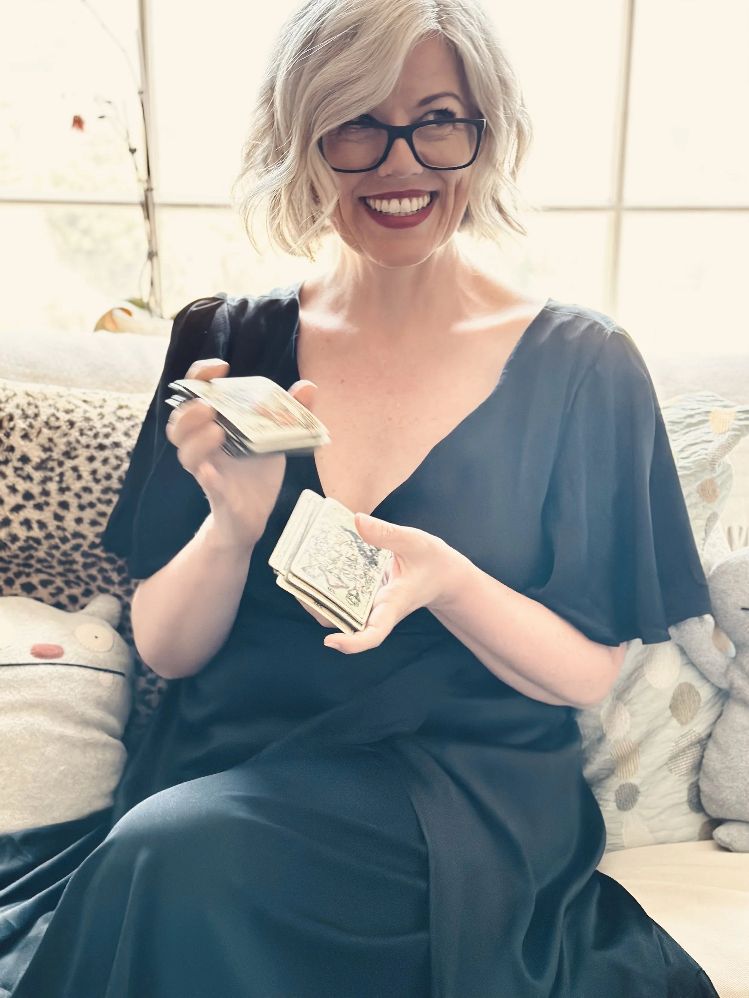 Lori Dyan preparing to give a tarot card reading