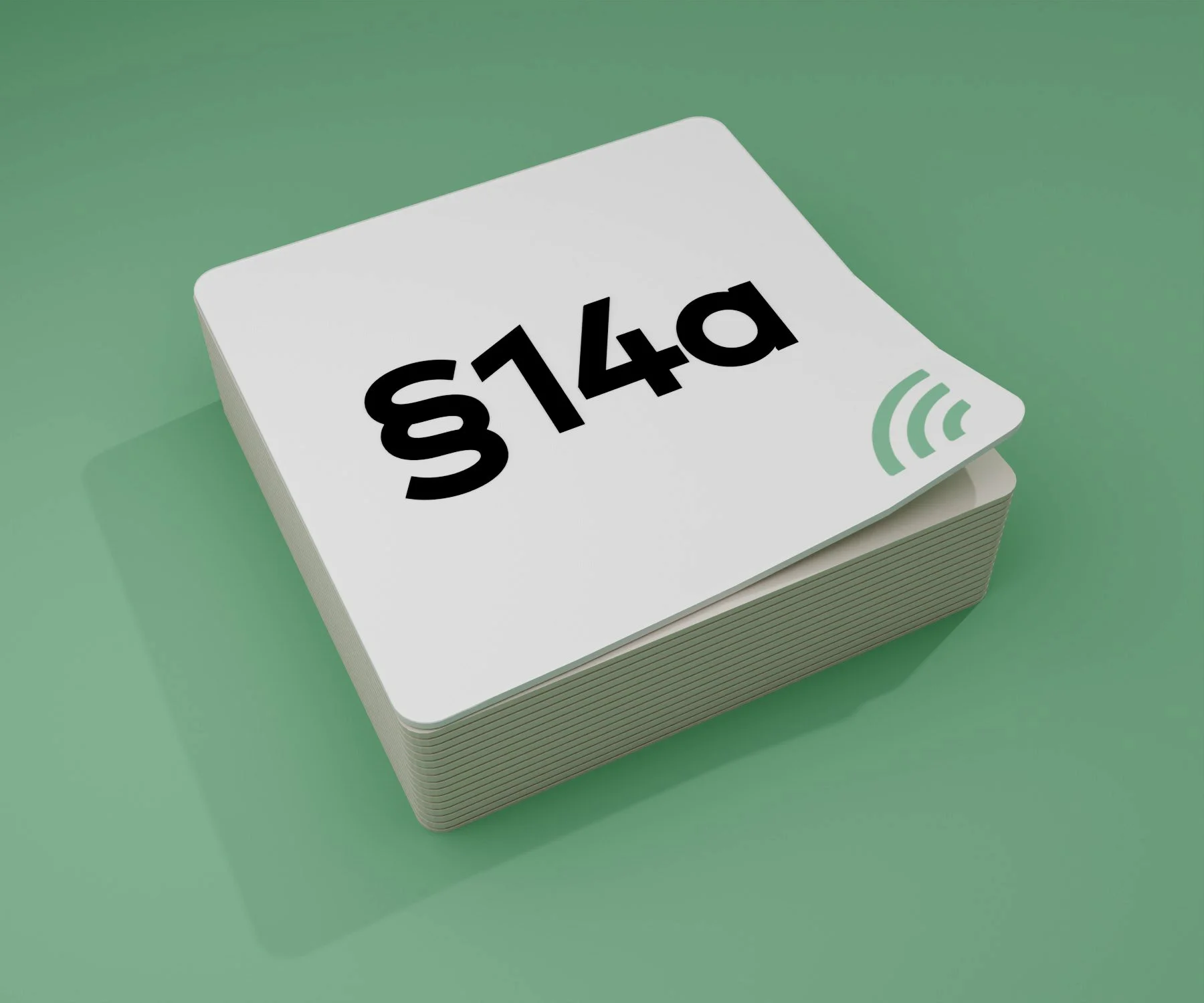 Ein Stapel weißer Post-Its mit der Aufschrift '§ 14a' in schwarzen Buchstaben, auf grünem Hintergrund.