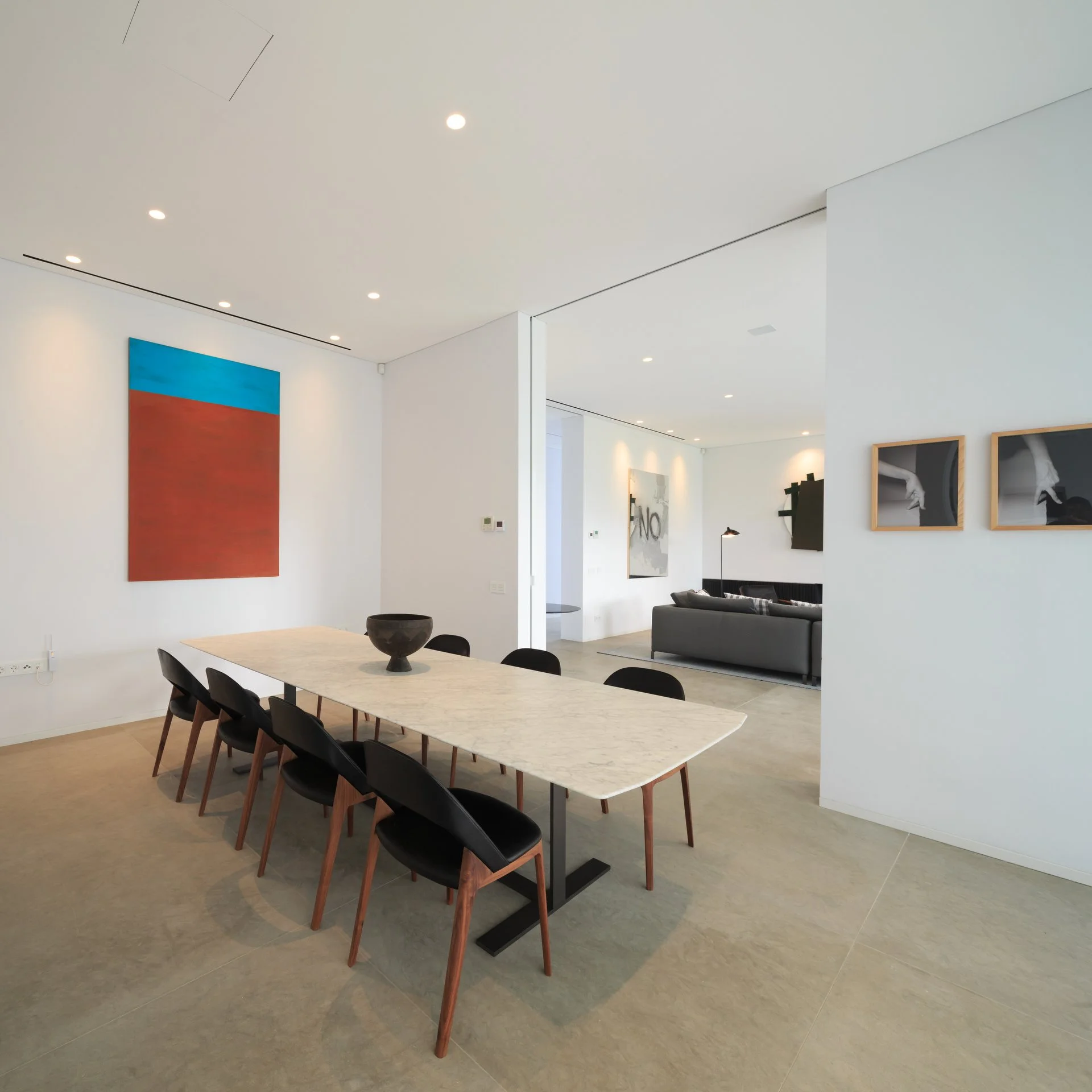 Dining space with pieces from our luxury partner B&B Italia and artwork by Helena Almeida