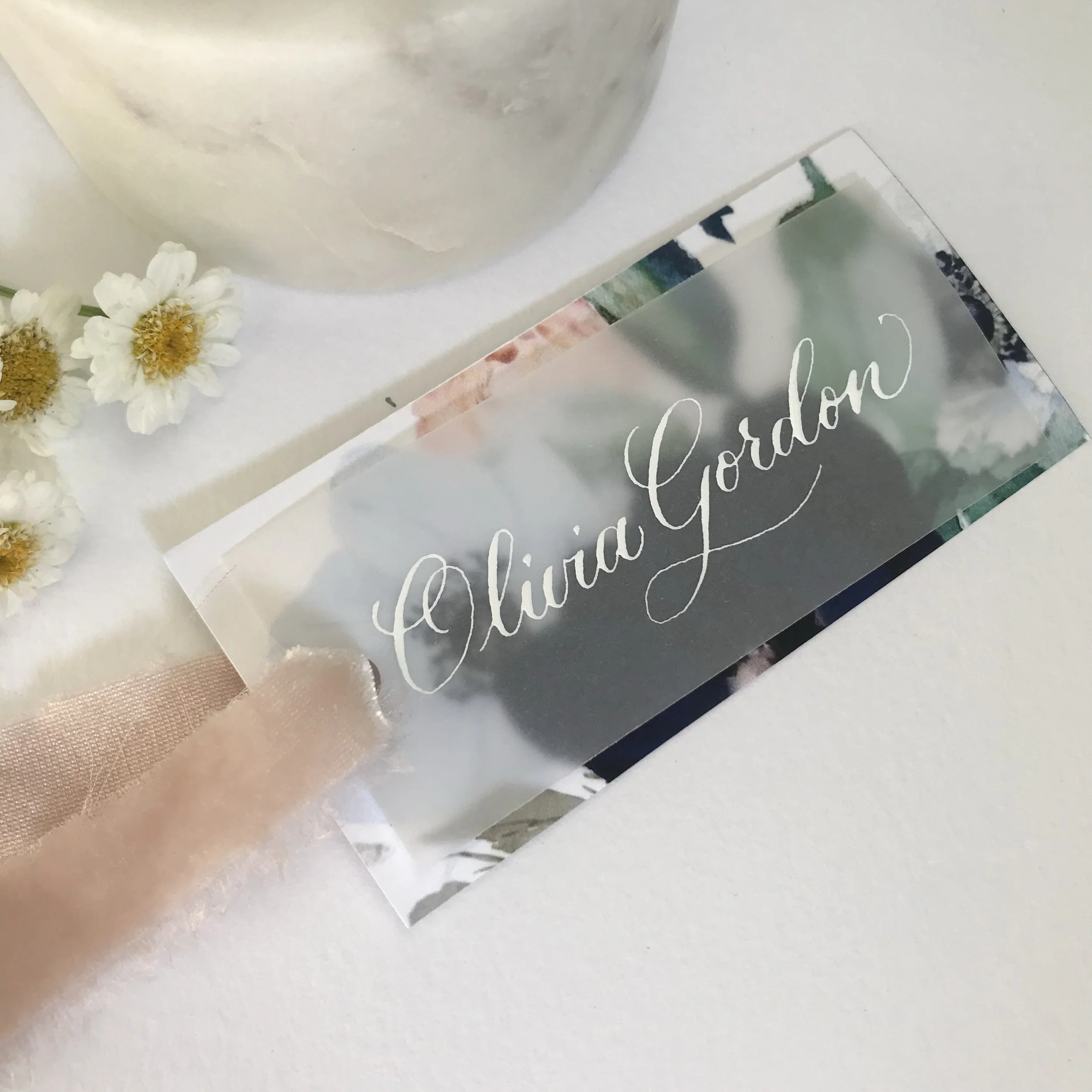 Copperplate calligraphy on a place card for a wedding reception 