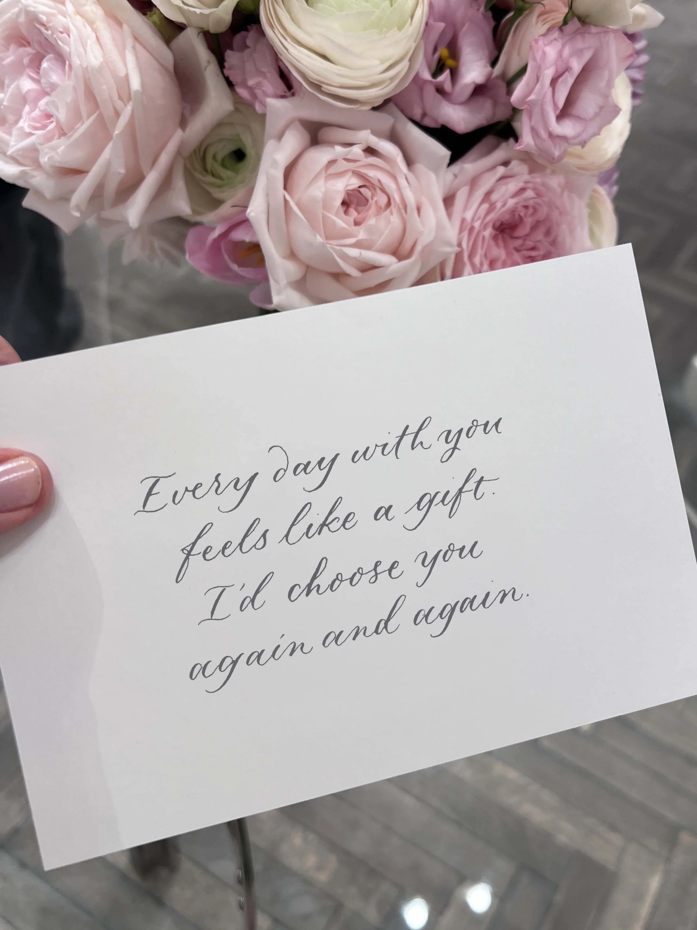 Live calligraphy being written at a luxury brand activation at Gucci